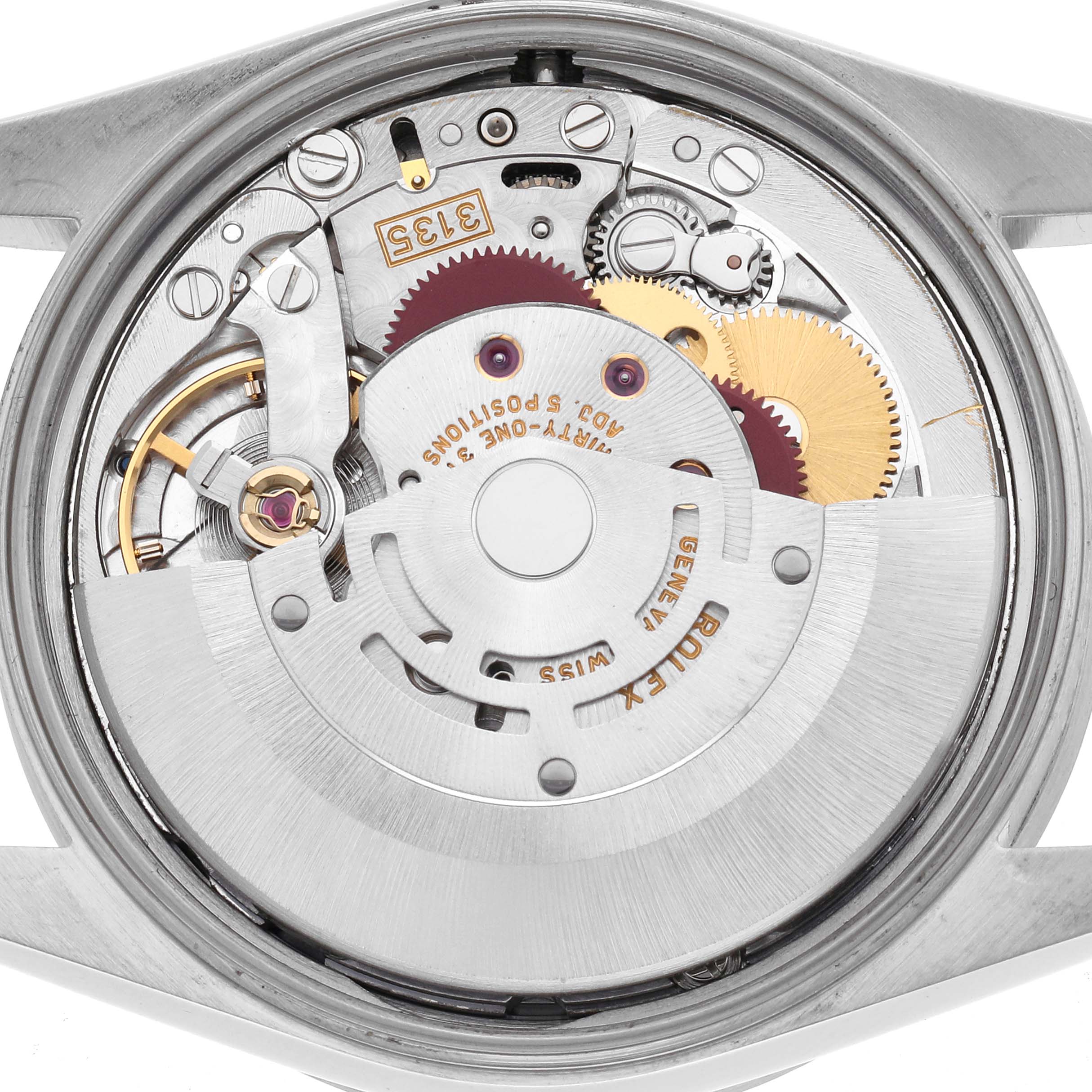 The image shows the movement of a Rolex Date 15210 Men
s Stainless Steel Silver Dial 15210 Men
s Stainless Steel Silver Dial watch from a back view, highlighting its intricate gears and rotor.