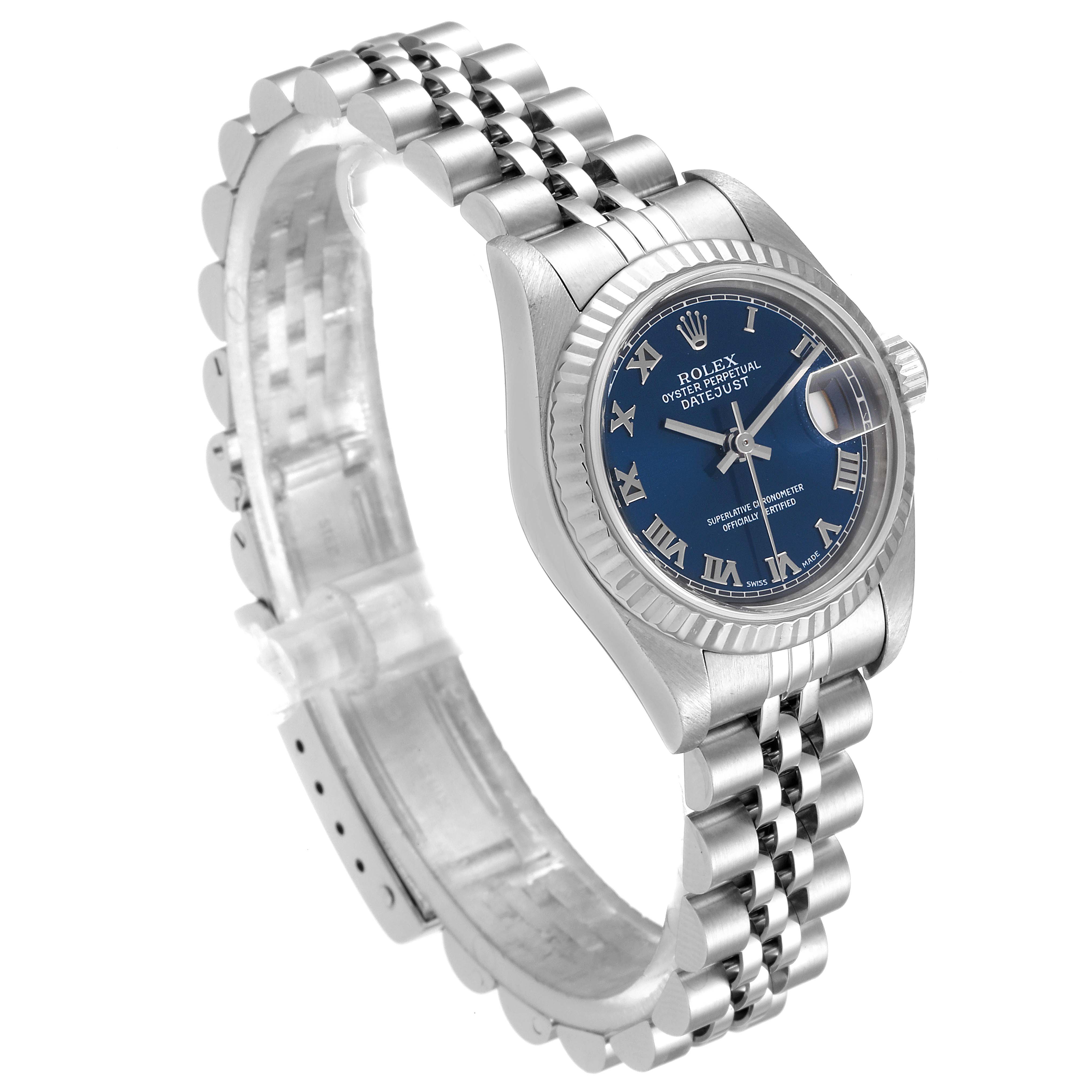 The Rolex Datejust 79174 Women's Stainless Steel Blue Dial 79174 Women's Stainless Steel Blue Dial watch is shown at an angle highlighting the bracelet, dial, bezel, and crown.