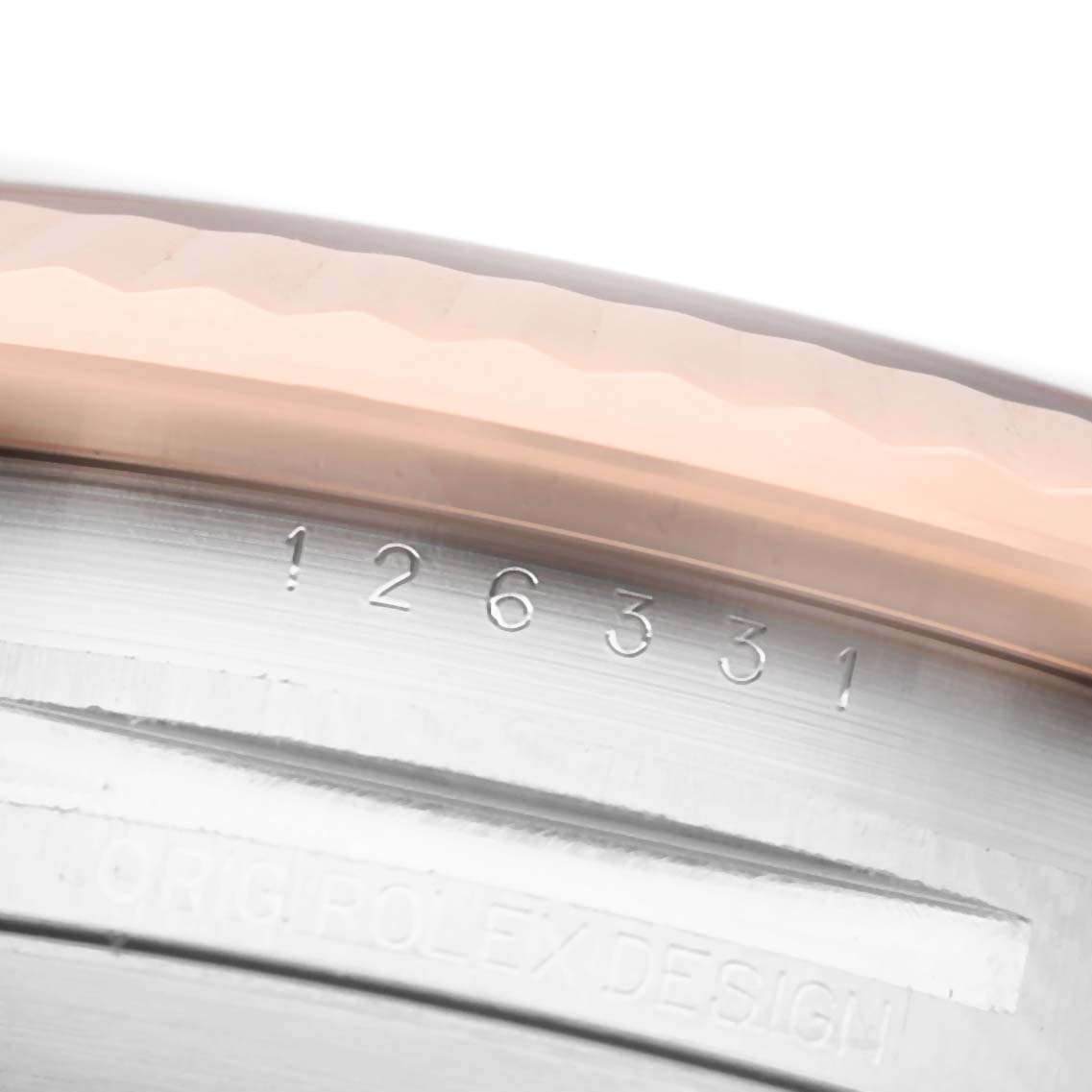 The image shows a close-up of the bezel and the engraved model number on the Rolex Datejust 41 126331 Men's Steel and Gold (two tone) Grey Dial watch.