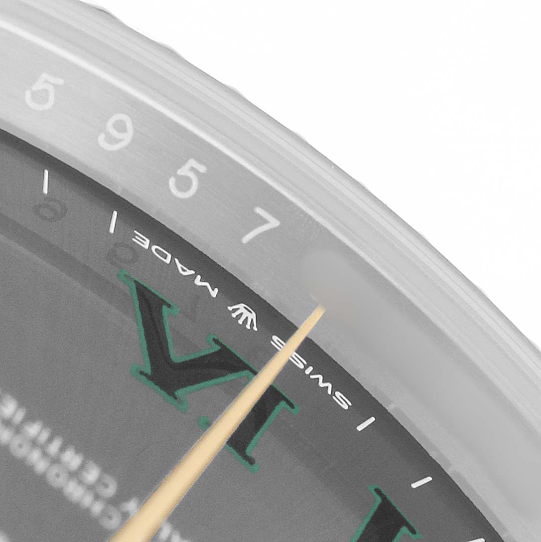 The image shows a close-up of the Rolex Datejust 41 126333 Men's Steel and Gold (two tone) Grey Dial dial and bezel, highlighting the Roman numeral "VI" and "Swiss Made" text.