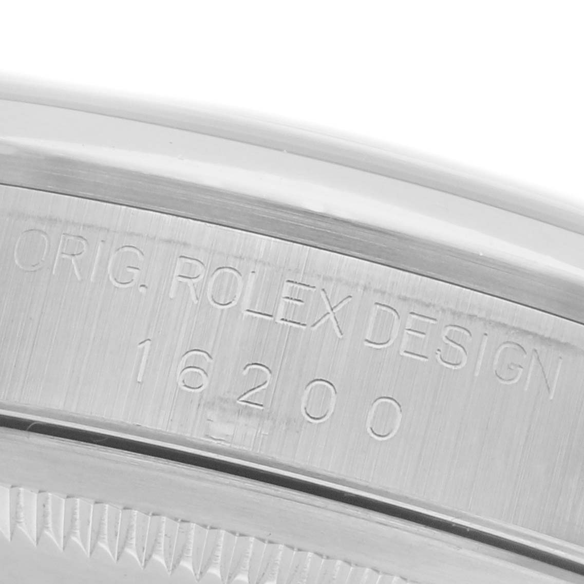 The image shows the side engraving of a Rolex Datejust 16200 Men's Stainless Steel Silver Dial 16200 Men's Stainless Steel Silver Dial with the model number 16200.
