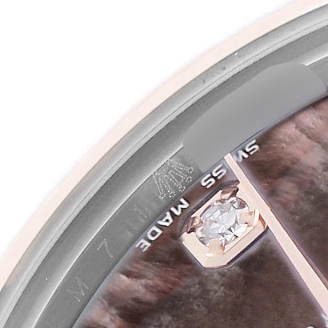 The image shows a close-up of the dial edge of a Rolex Mid-Size 178271 Women's Steel and Gold (two tone) Mother of Pearl Dial 178271 Women's Steel and Gold (two tone) Mother of Pearl Dial watch, highlighting a diamond marker and the "Swiss Made" text.