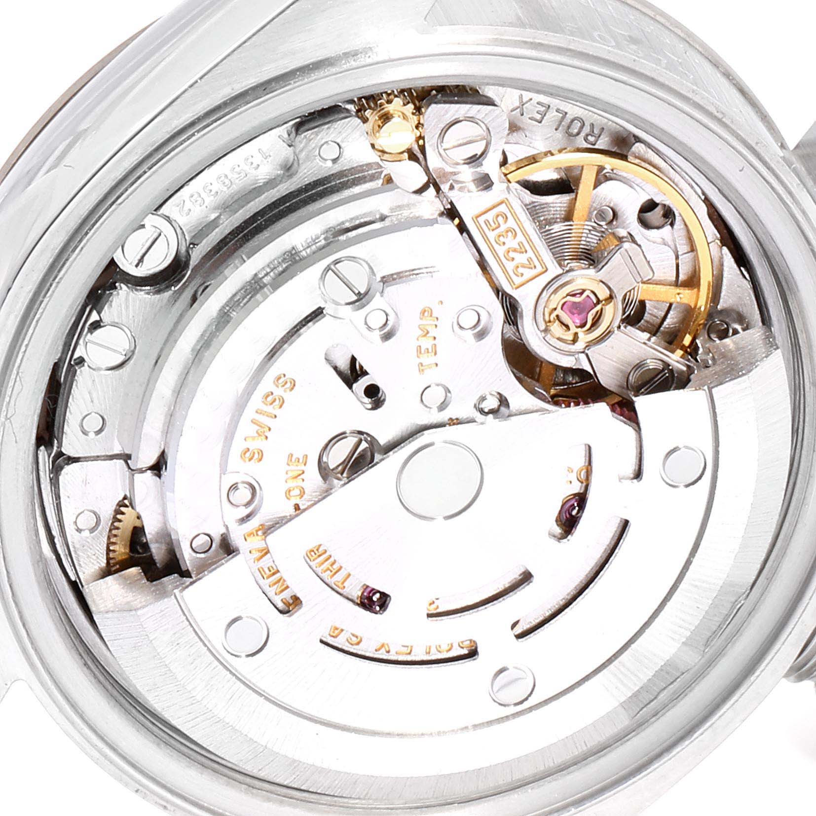 This is a close-up view of the movement mechanism of a Rolex Datejust 79174 Women
s Stainless Steel Pink Dial 79174 Women
s Stainless Steel Pink Dial watch.