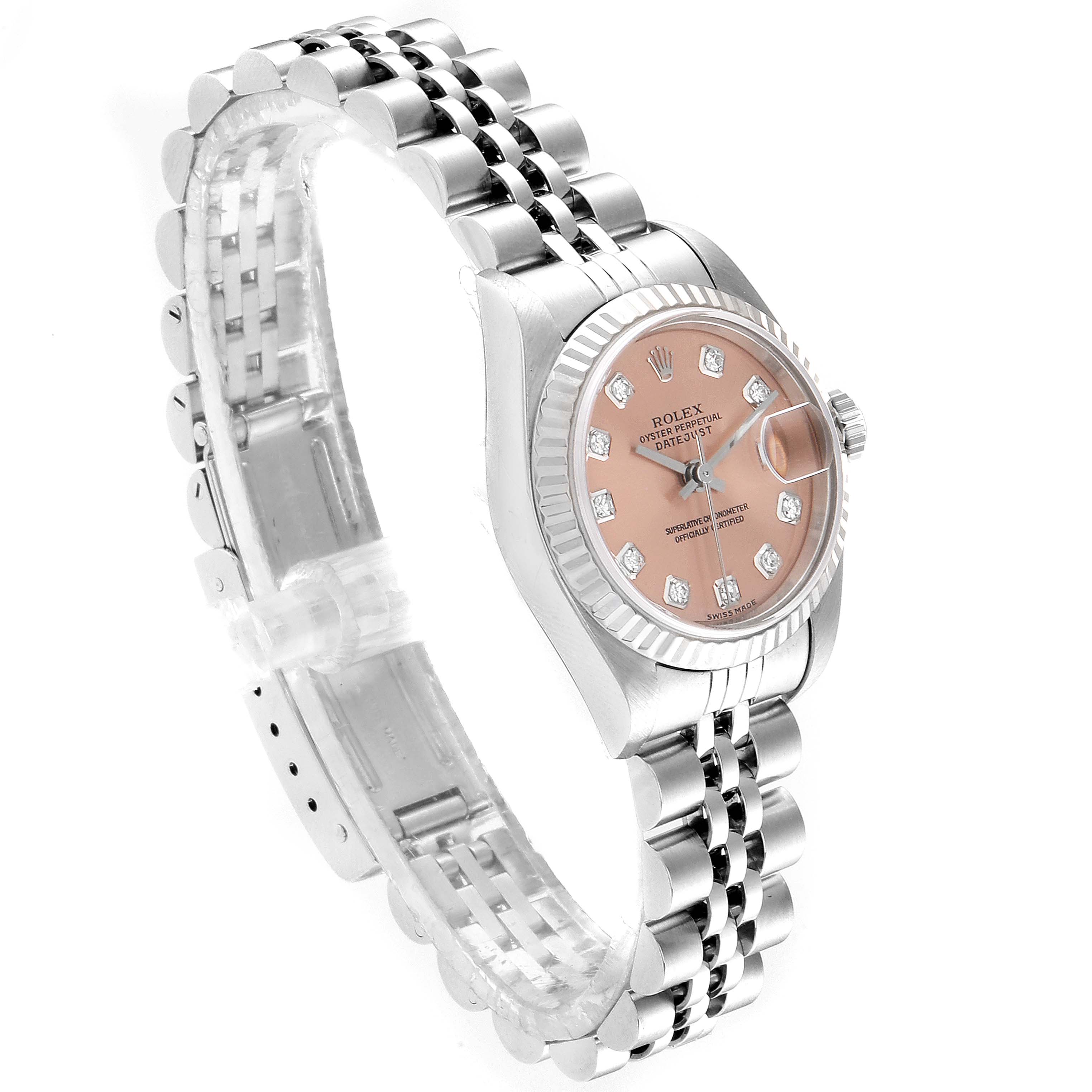 The image shows a Rolex Datejust 79174 Women
s Stainless Steel Pink Dial 79174 Women
s Stainless Steel Pink Dial watch from an angled side view, highlighting its pink dial, jubilee bracelet, and fluted bezel.
