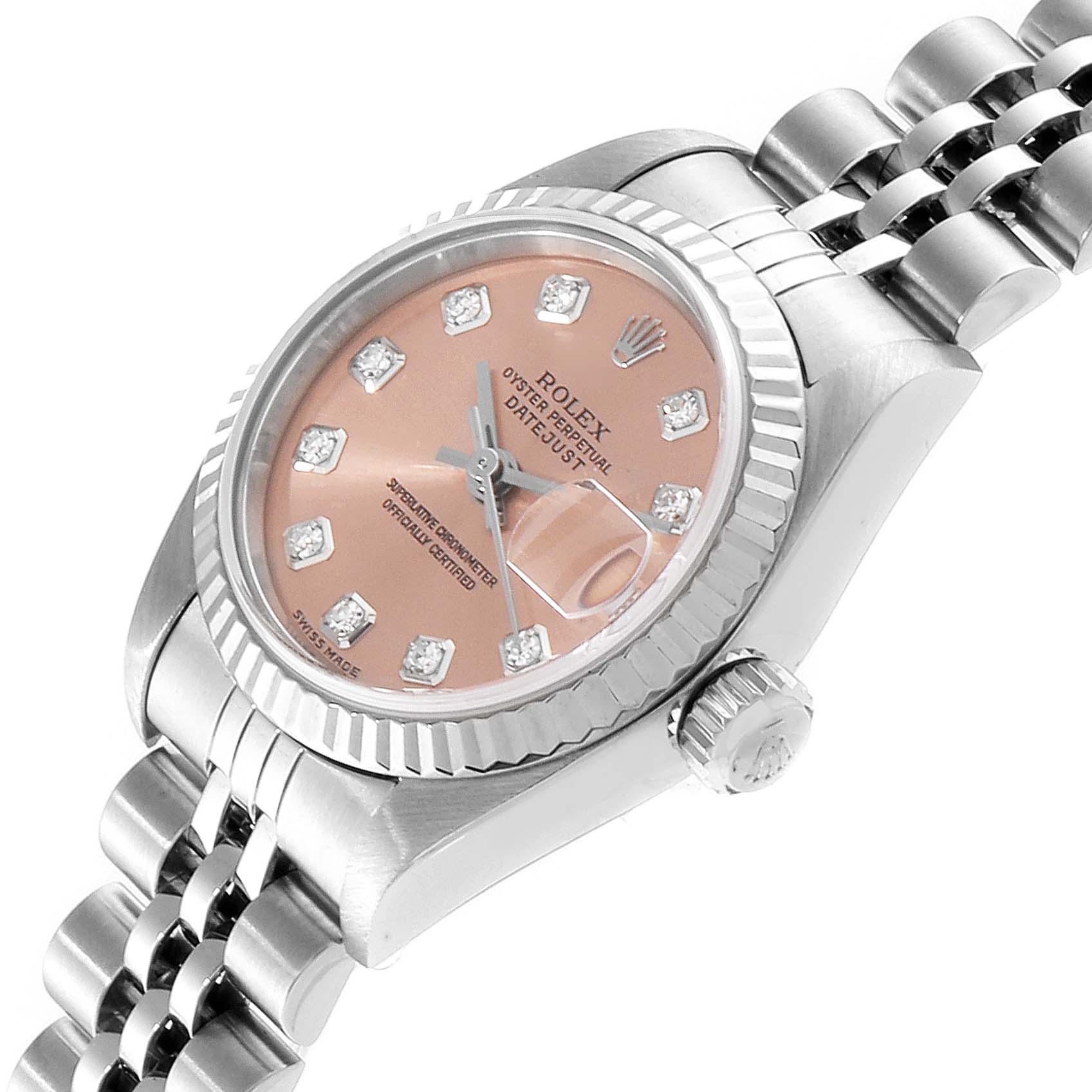 This image shows a close-up view of the Rolex Datejust 79174 Women
s Stainless Steel Pink Dial 79174 Women
s Stainless Steel Pink Dial watch, highlighting the dial, case, bezel, crown, and part of the bracelet.