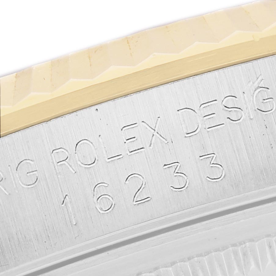 The image shows an engraved side view of the Rolex Datejust 16233 Men's Steel and Gold (two tone) Beige Dial 16233 Men's Steel and Gold (two tone) Beige Dial model's case, highlighting the reference number and design inscription.