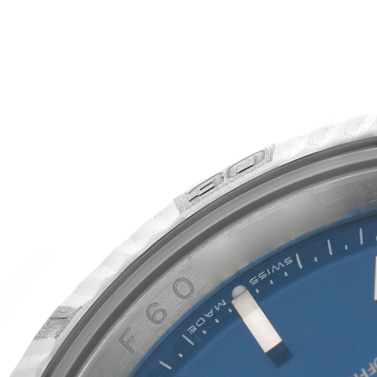The image shows a close-up of the bezel and part of the dial of the Rolex Turn-o-Graph 116264 Men's Stainless Steel Blue Dial watch, highlighting the "20" on the bezel.