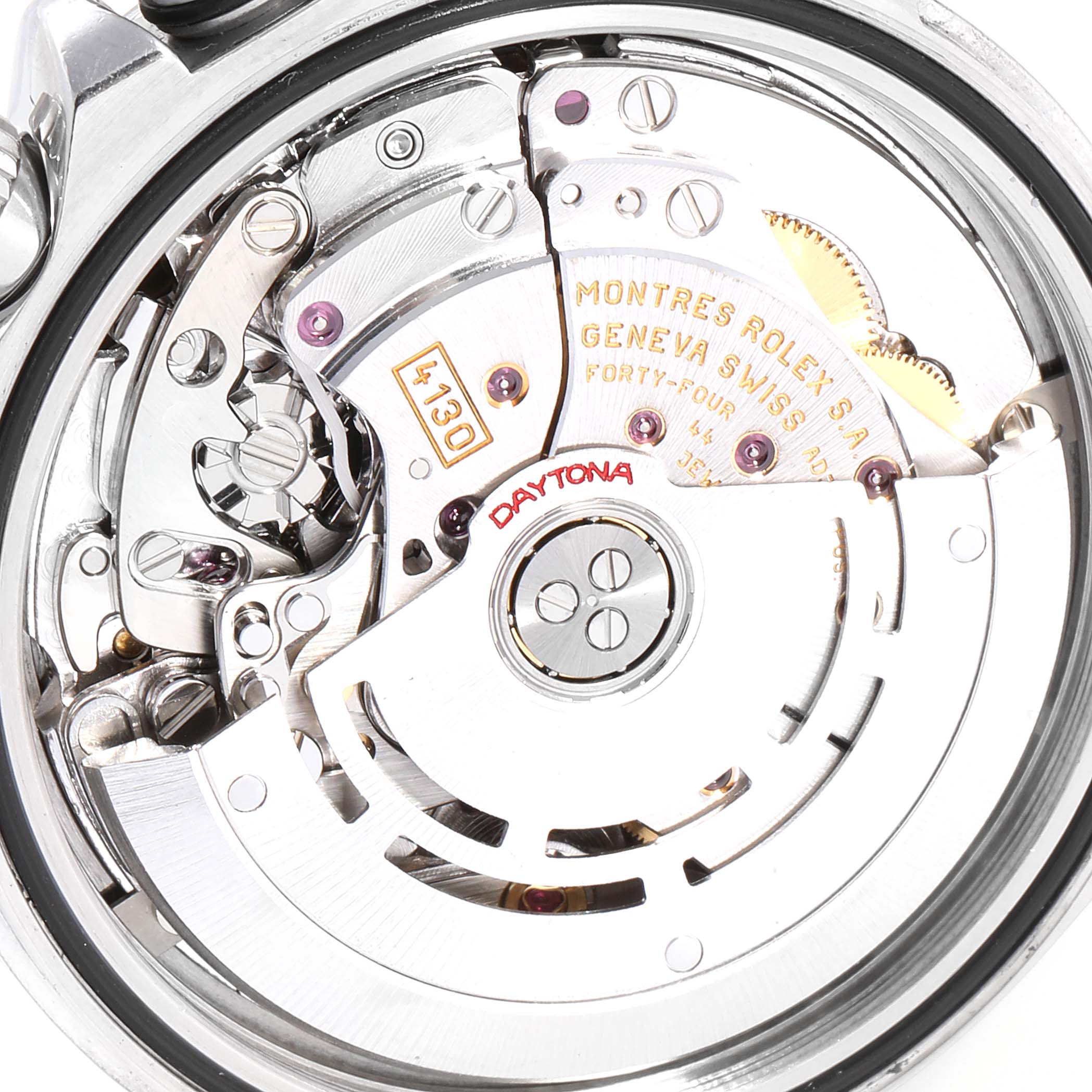 This image shows a close-up of the intricate inner mechanisms of a Rolex Daytona 116520 Men's Stainless Steel Black Dial 116520 Men's Stainless Steel Black Dial watch movement.