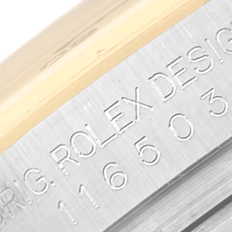 The image shows a close-up of the serial engraving on a Rolex Daytona 116503 Men's Steel and Gold (two tone) Champagne Dial 116503 Men's Steel and Gold (two tone) Champagne Dial watch model.