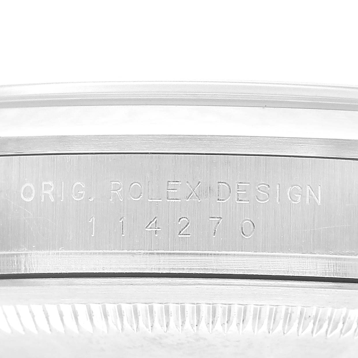 The image shows the side engraving on the Explorer model by Rolex, displaying the model number 114270.