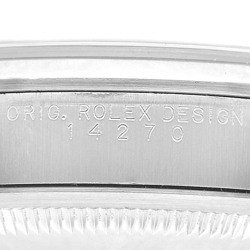 The image shows a close-up of the case edge with the model number "14270" engraved on the Rolex Explorer 14270 Men's Stainless Steel Black Dial watch.