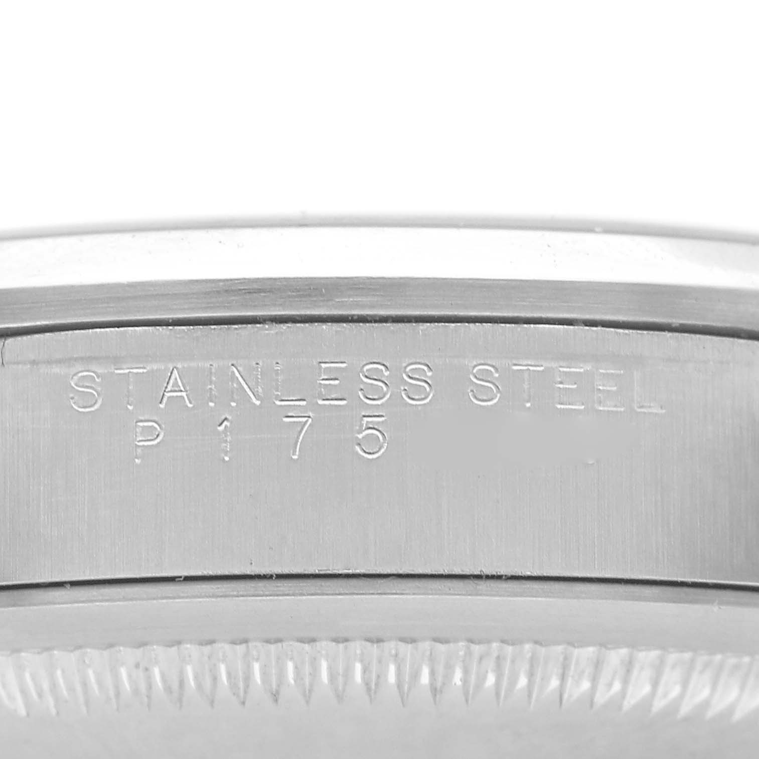 The image shows a close-up of the edge and side engraving of a Rolex Explorer 14270 Men's Stainless Steel Black Dial watch in stainless steel.