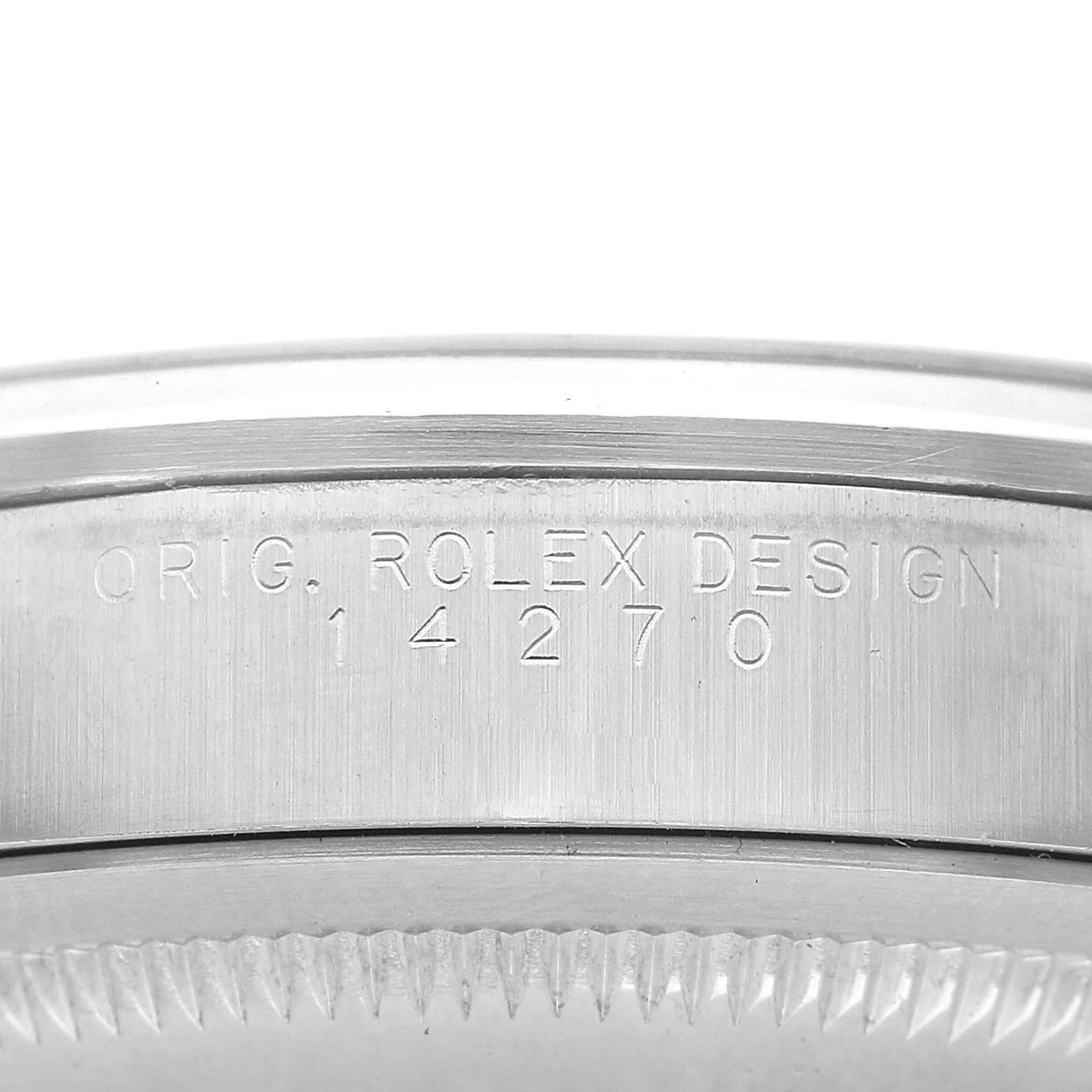 The image shows a close-up of the case side of a Rolex Explorer 14270 Men's Stainless Steel Black Dial, displaying the engraved design number.