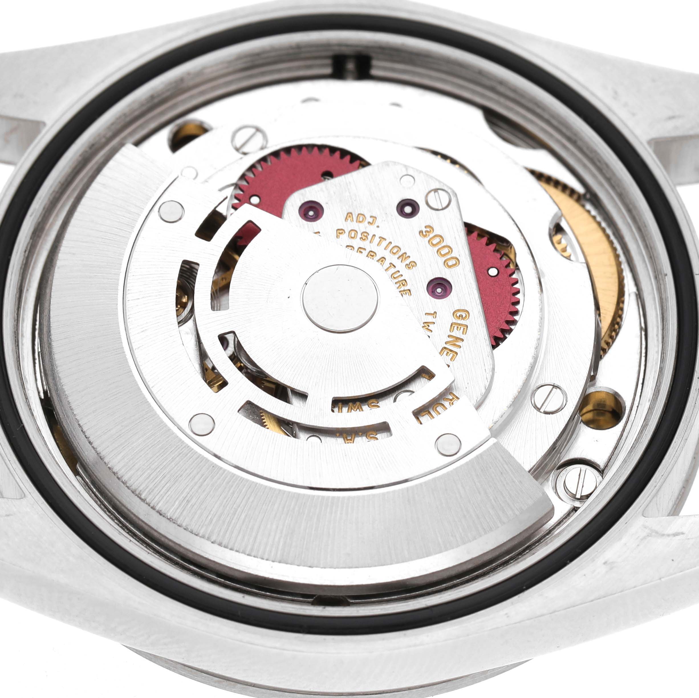 The image shows the back view of a Rolex Explorer 14270 Men's Stainless Steel Black Dial, highlighting its internal movement components.