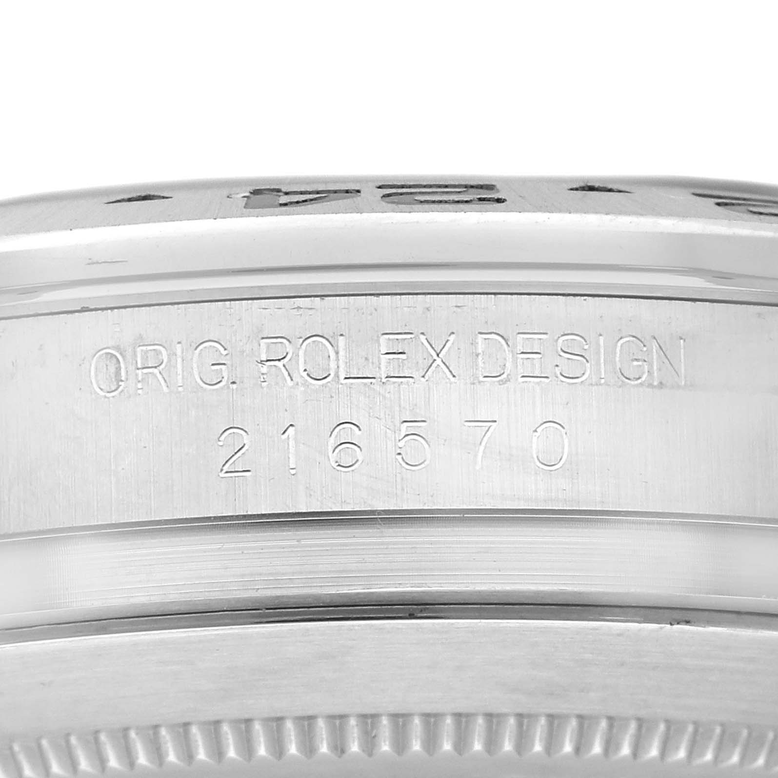 This close-up image shows the engraved model number and the words "ORIG. ROLEX DESIGN" on the case side of a Rolex Explorer 216570 Men
s Stainless Steel Black Dial 216570 Men
s Stainless Steel Black Dial.