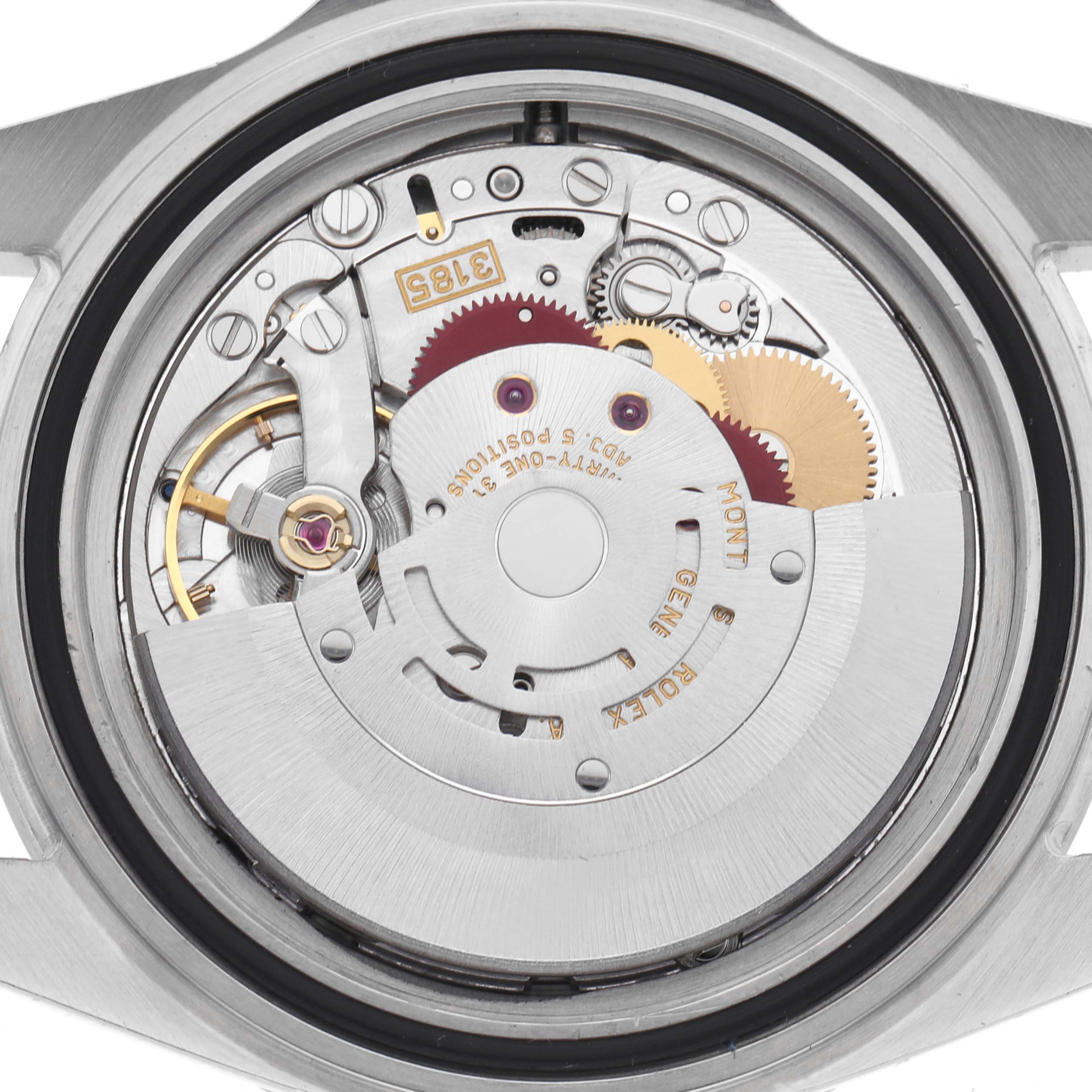 The image shows the movement of a Rolex Explorer 16570 Men's Stainless Steel Black Dial 16570 Men's Stainless Steel Black Dial watch from a close-up, showcasing its intricate internal components.