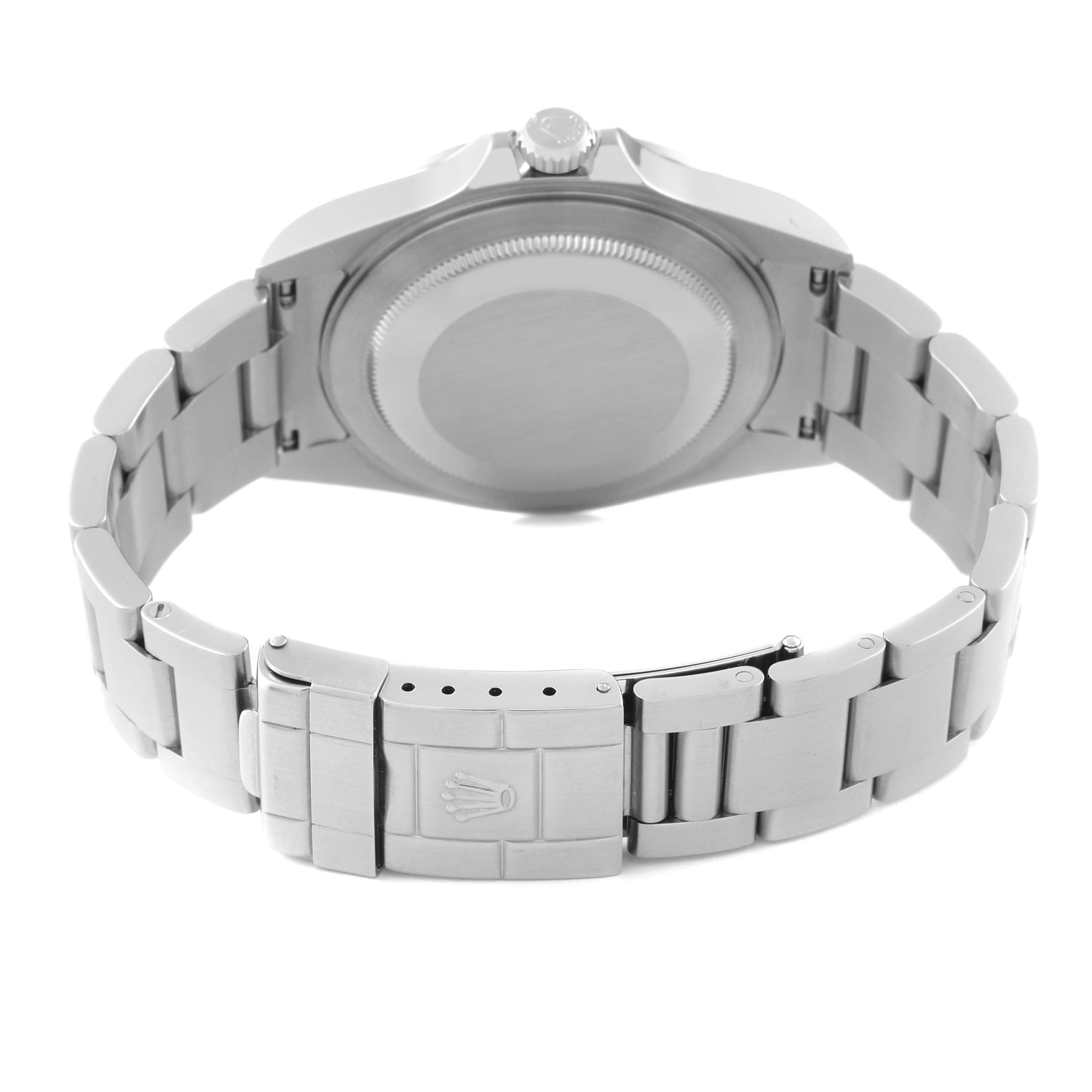 This image shows the Rolex Explorer 16570T Men
s Stainless Steel Black Dial 16570T Men
s Stainless Steel Black Dial watch from the back, displaying the caseback, crown, and bracelet with clasp.