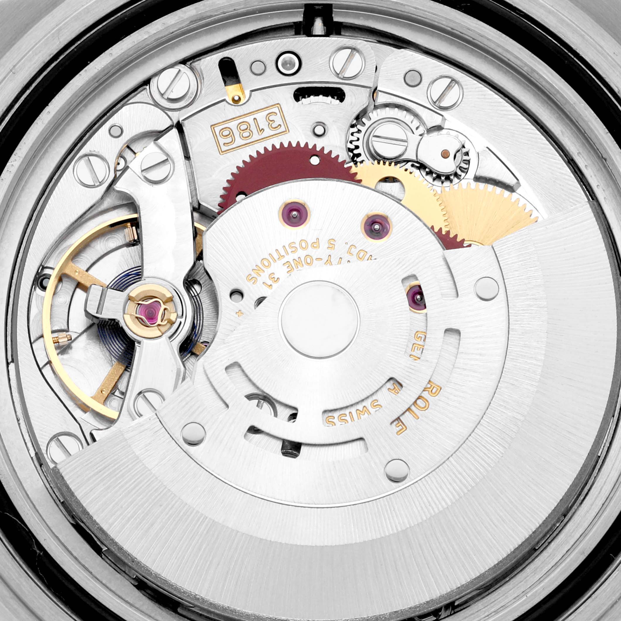 The image shows a close-up, internal view of the movement mechanism of a Rolex Explorer 16570T Men
s Stainless Steel Black Dial 16570T Men
s Stainless Steel Black Dial watch.