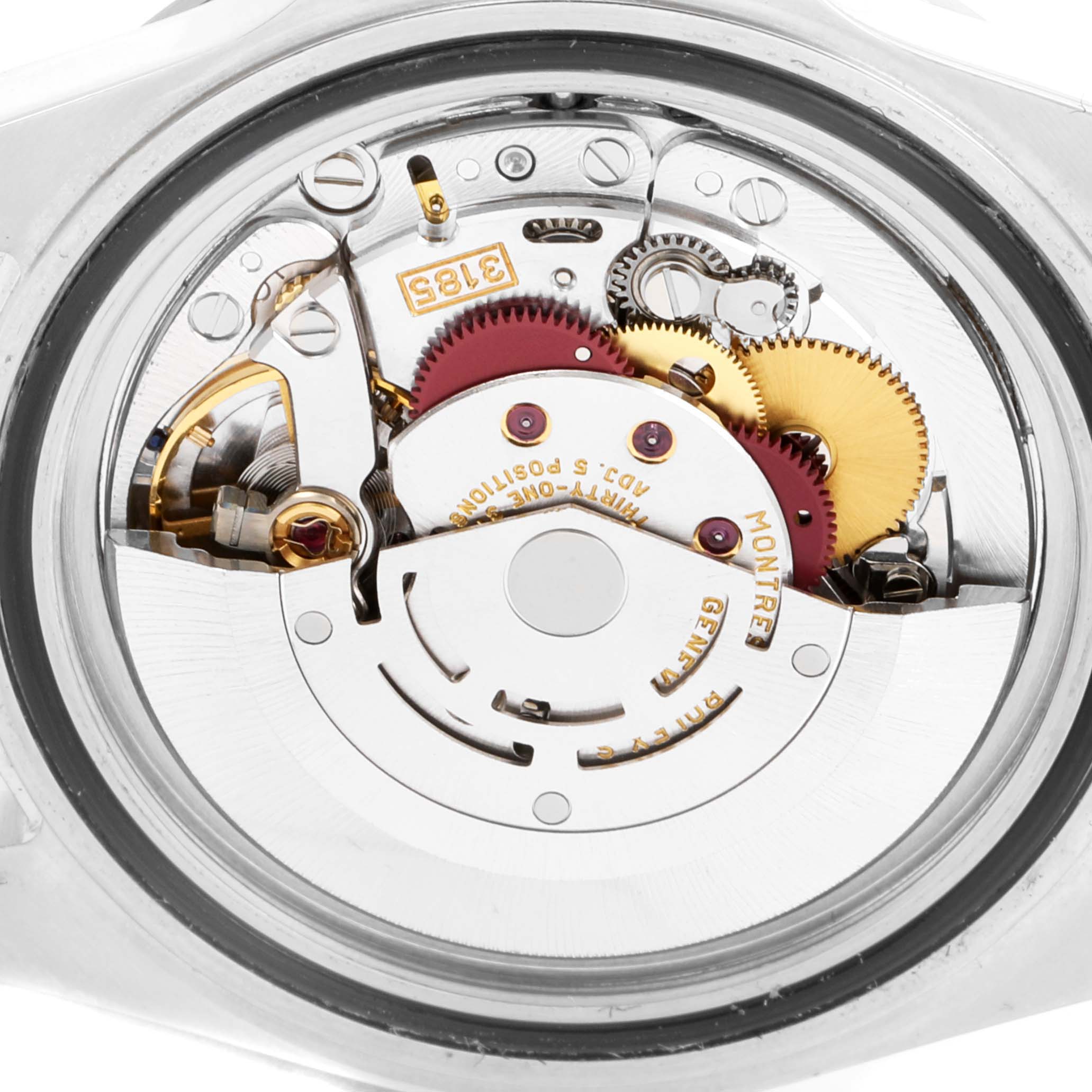 The back view of a Rolex Explorer 16570 Men
s Stainless Steel White Dial 16570 Men
s Stainless Steel White Dial watch showcasing its intricate internal movement and components.