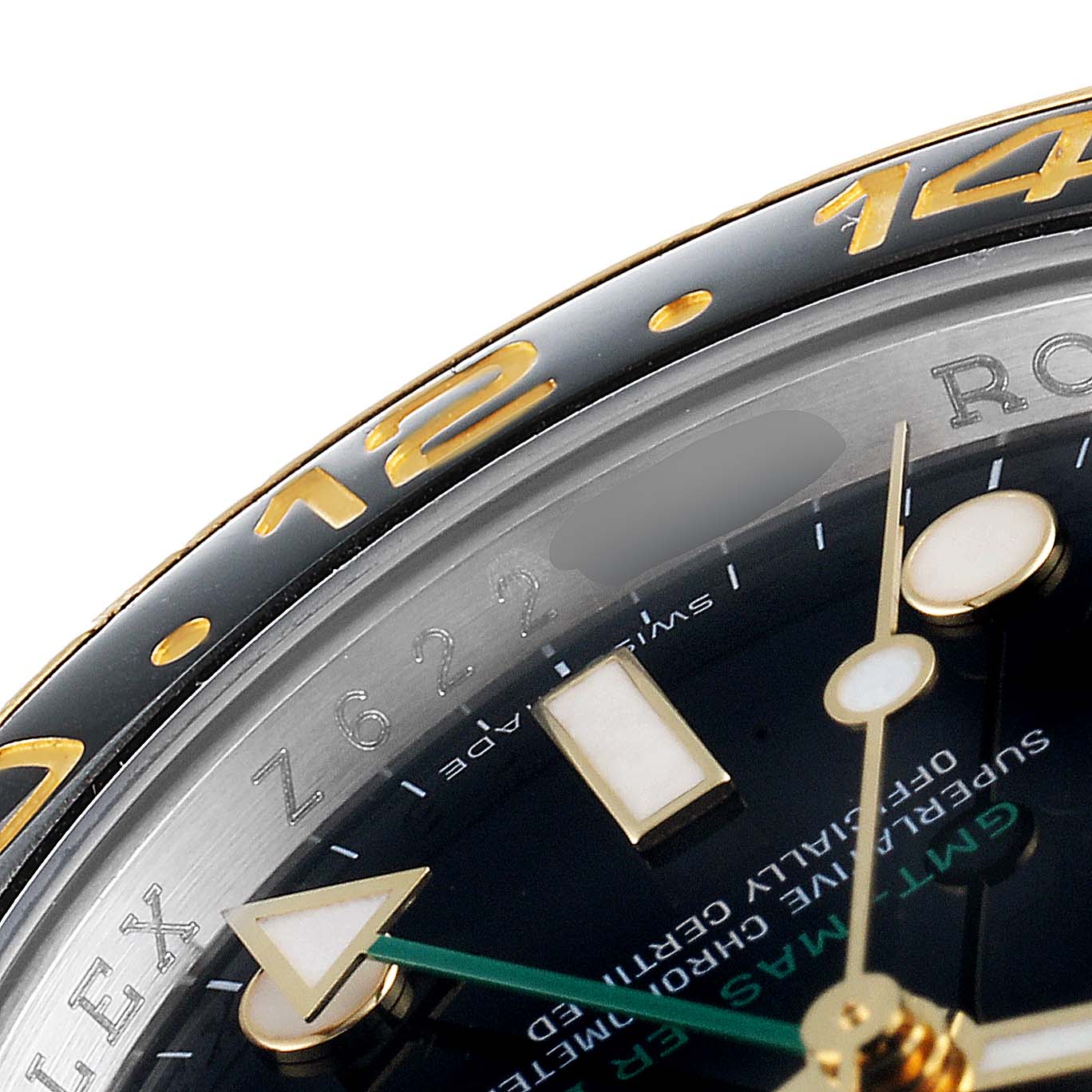 This image shows a close-up of the dial, bezel, and hands of a Rolex GMT-Master 116713 Men's Steel and Gold (two tone) Black Dial 116713 Men's Steel and Gold (two tone) Black Dial watch.
