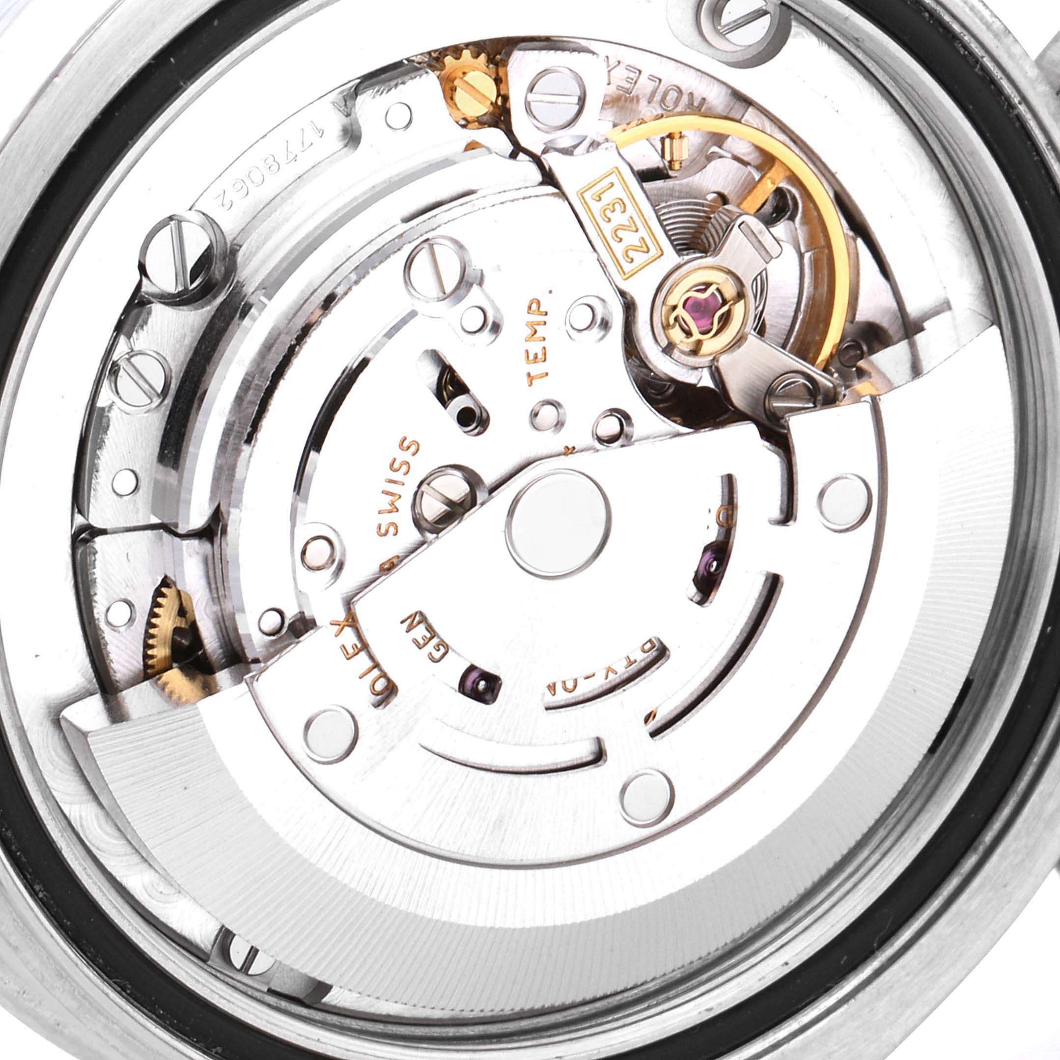 This image shows the intricate movement mechanism inside a Mid-Size Rolex watch, captured from the back.