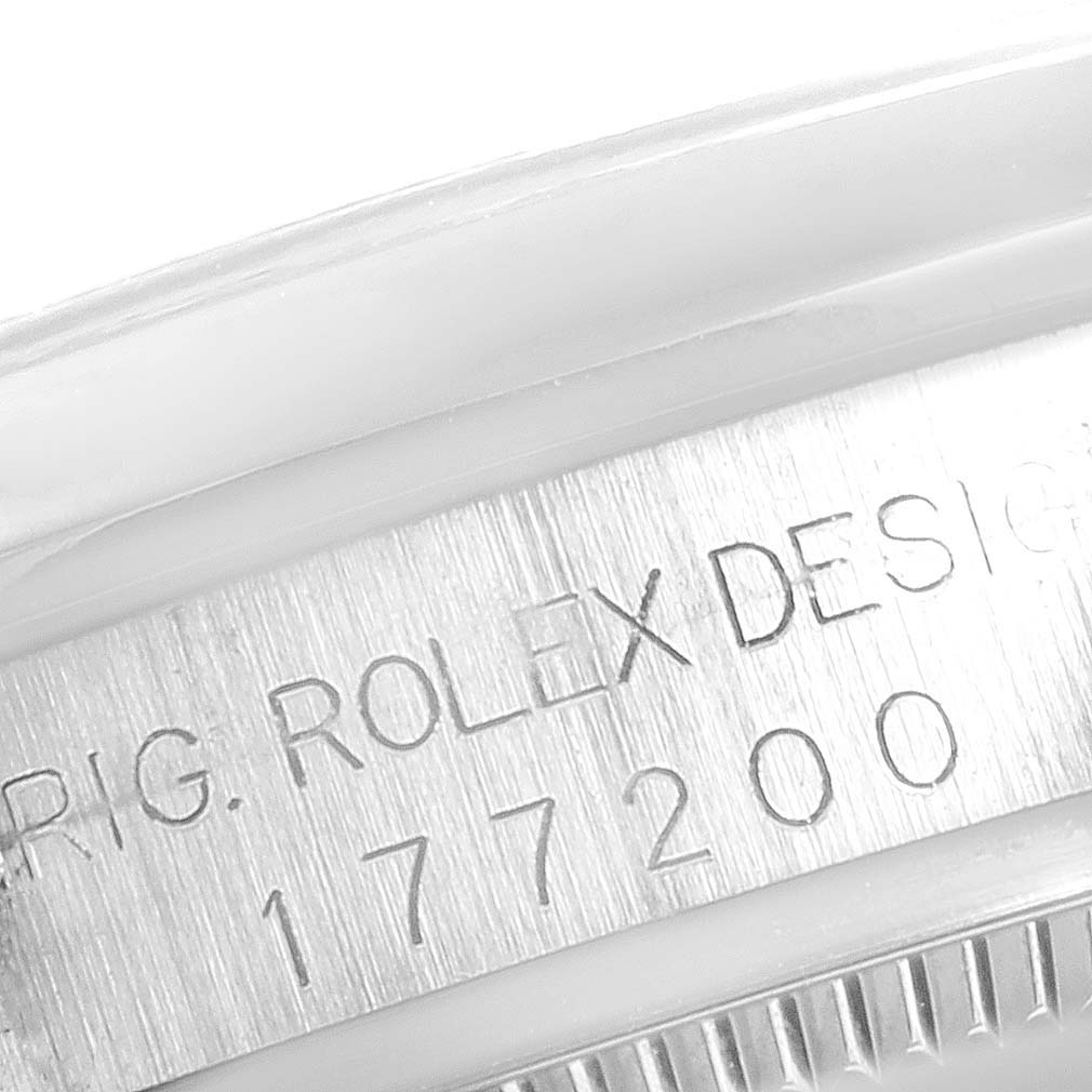 The image shows a close-up of the side engraving on a Rolex Mid-Size 177200 Women
s Stainless Steel Silver Dial 177200 Women
s Stainless Steel Silver Dial watch, highlighting the model number.