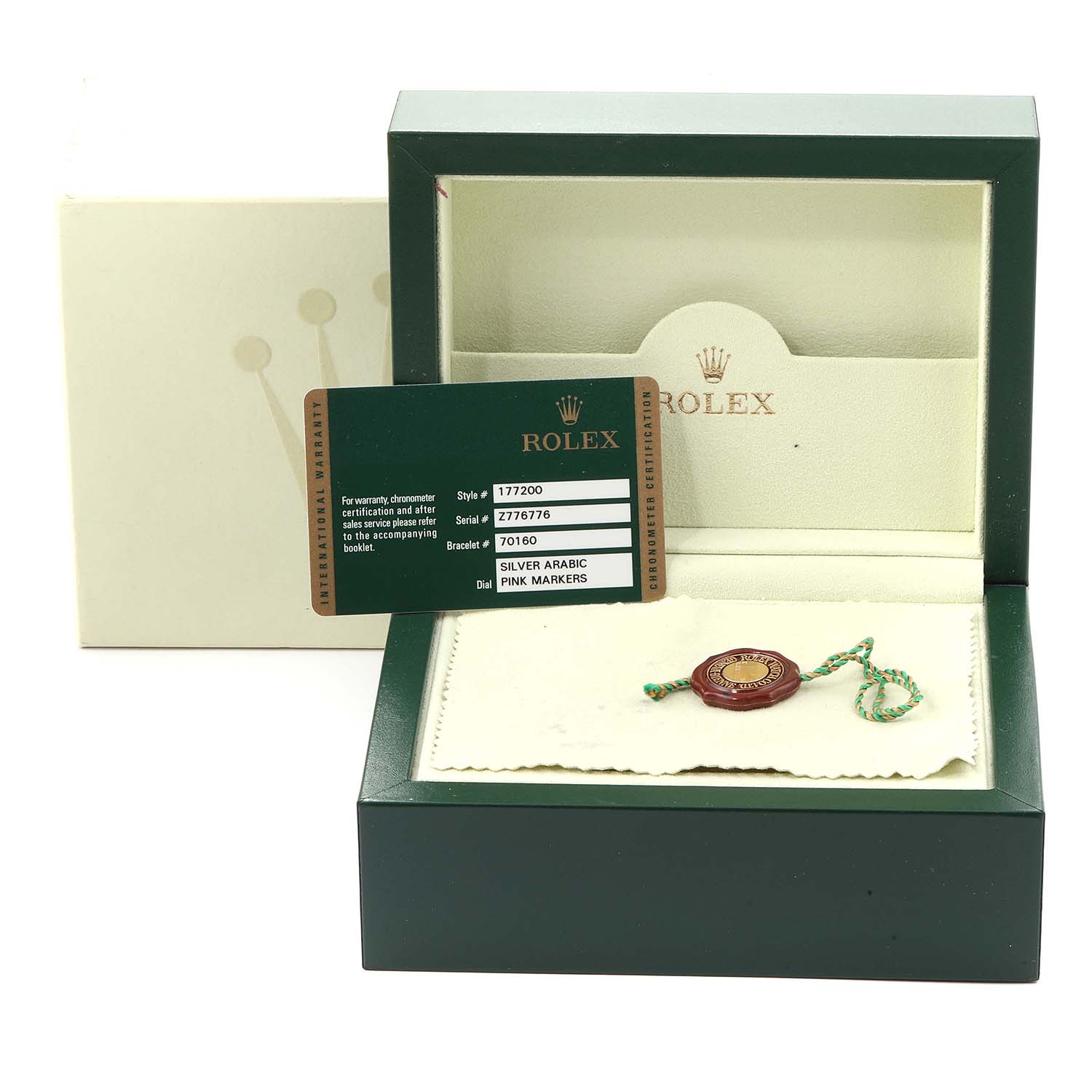 The image shows the open box, tags, and warranty card for a Rolex Mid-Size 177200 Women
s Stainless Steel Silver Dial 177200 Women
s Stainless Steel Silver Dial model, with the box lid lifted and the interior visible.