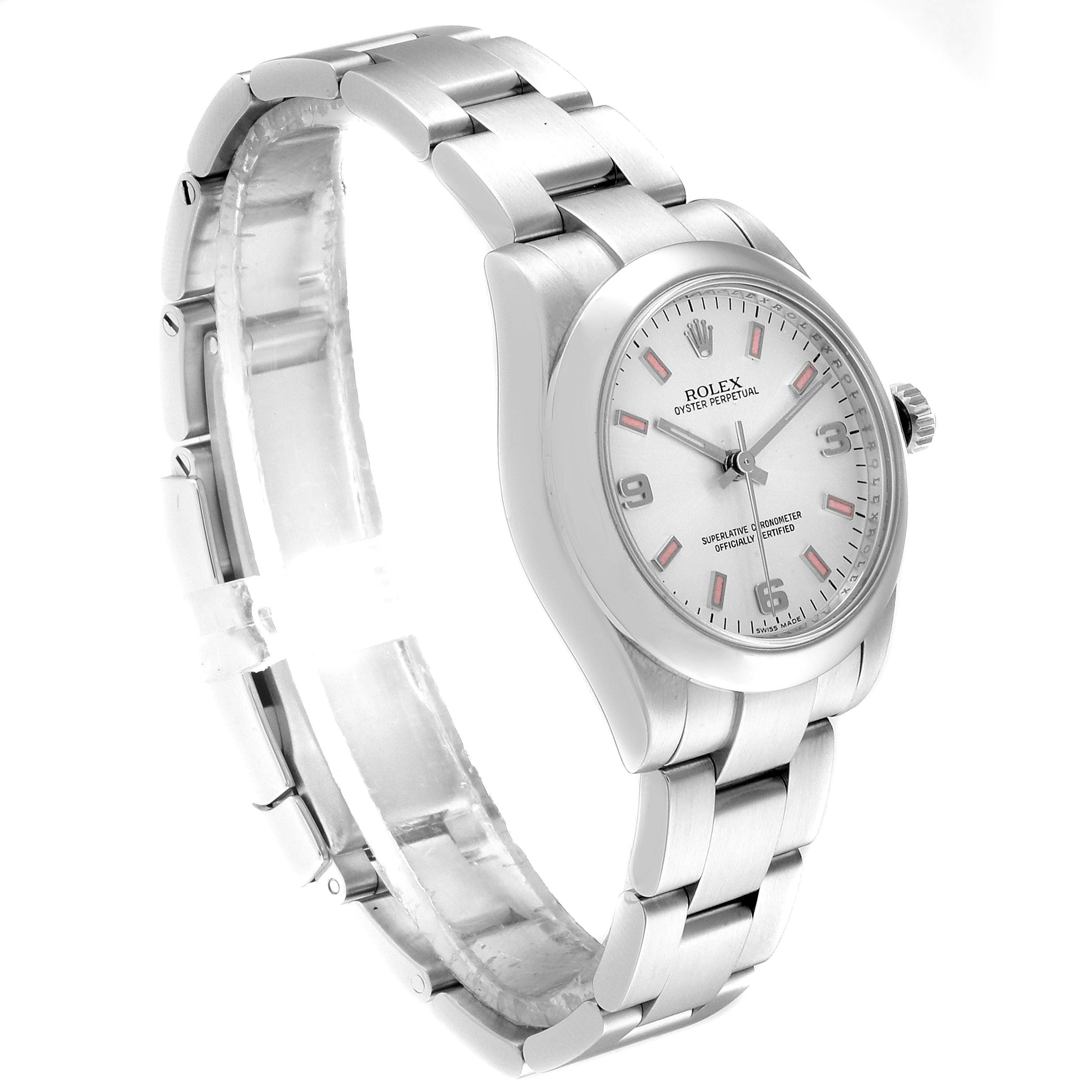 The image shows a side angle of a Rolex Mid-Size 177200 Women
s Stainless Steel Silver Dial 177200 Women
s Stainless Steel Silver Dial model Oyster Perpetual watch, highlighting the dial and bracelet.