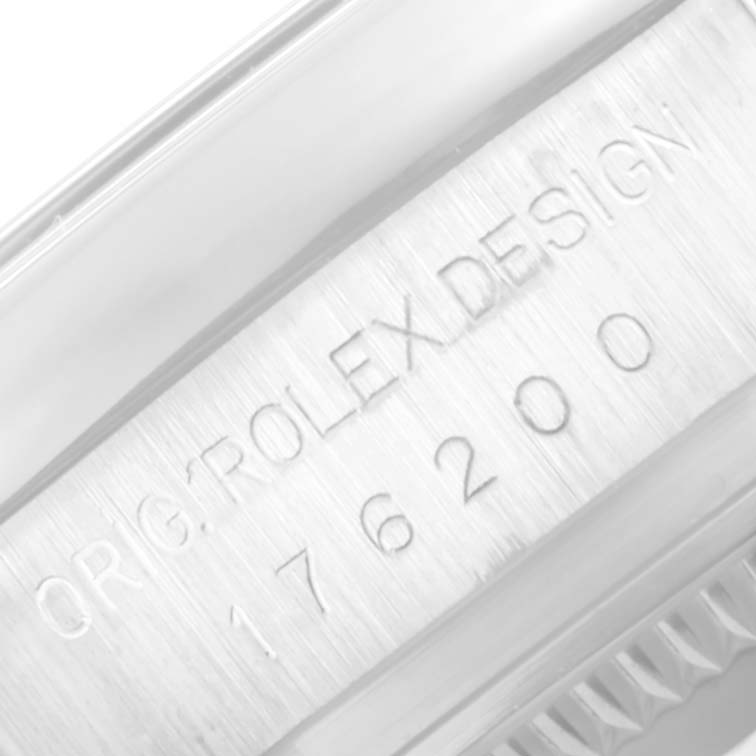 This close-up image shows the engraving on the side of a Rolex Oyster Perpetual 176200 Women's Stainless Steel Pink Dial 176200 Women's Stainless Steel Pink Dial watch case.