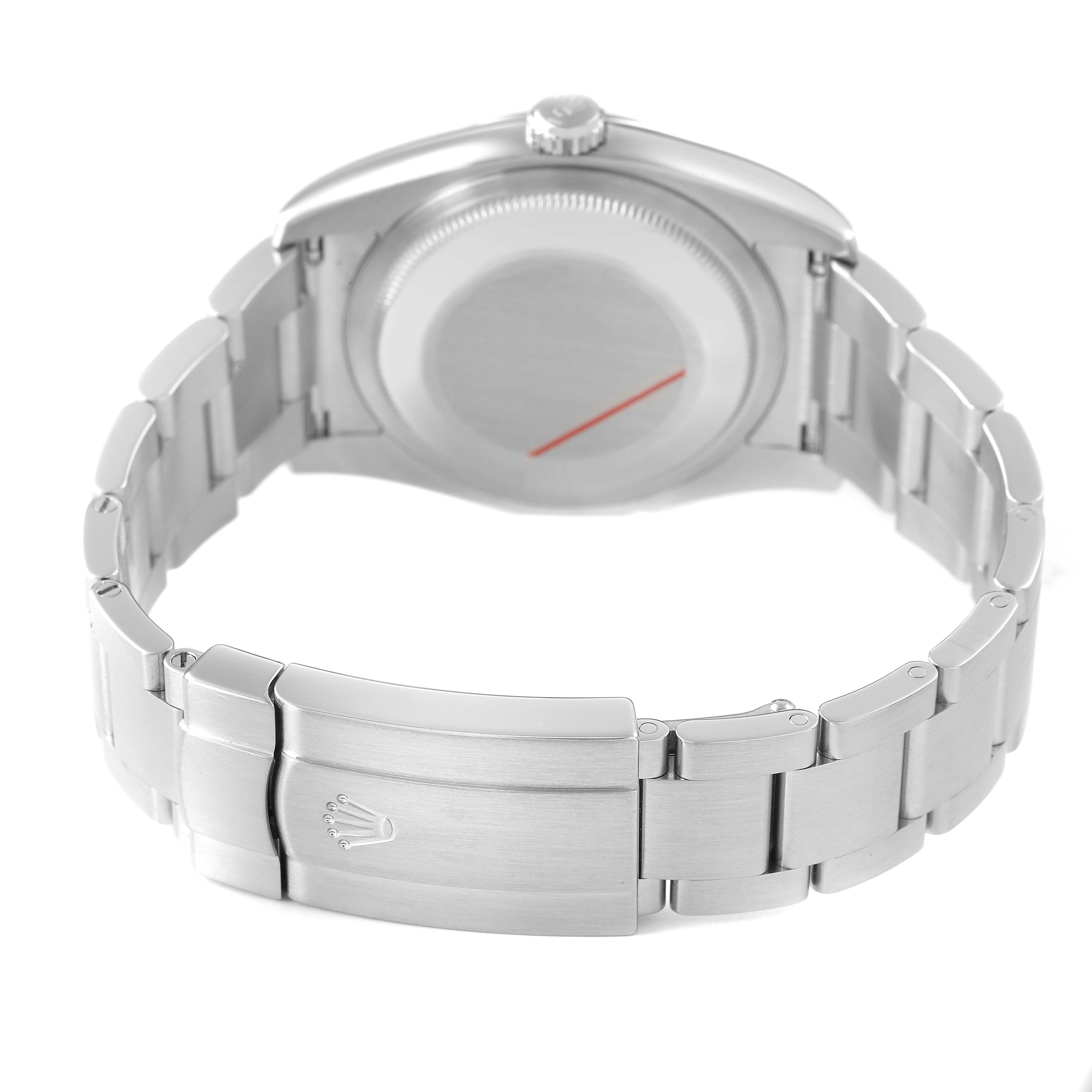 The image shows the back view of a Rolex Oyster Perpetual 116000 Men's Stainless Steel Blue Dial watch, highlighting the case back and bracelet clasp.