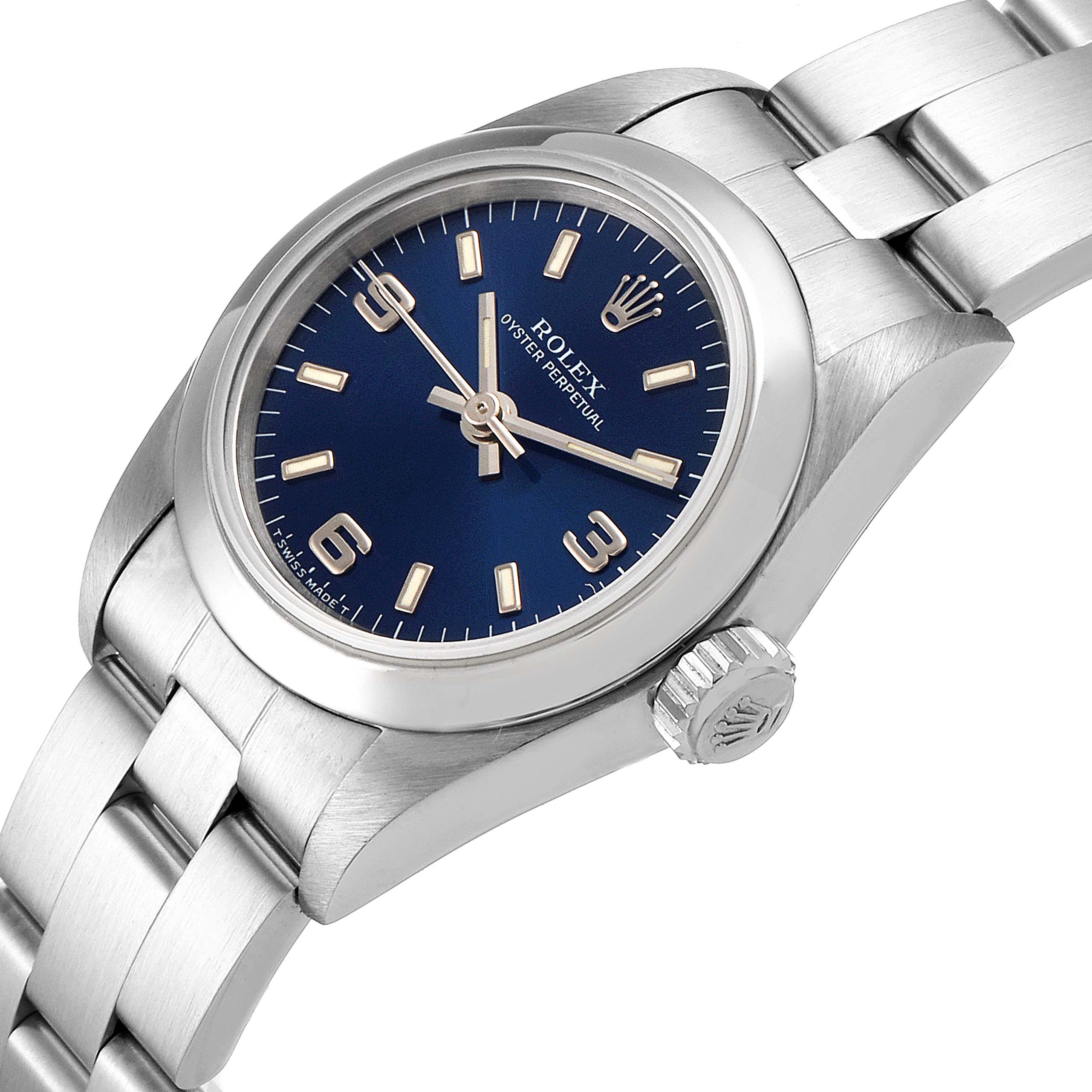 The image shows a close-up view of a Rolex Oyster Perpetual 67180 Women
s Stainless Steel Blue Dial 67180 Women
s Stainless Steel Blue Dial watch focusing on the dial, crown, and part of the bracelet.
