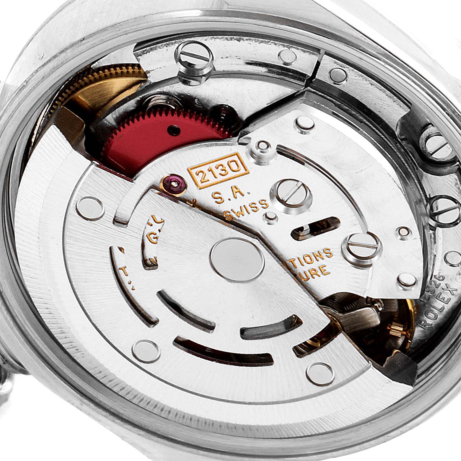 This image shows an angled close-up of the inner mechanical movement of the Rolex Oyster Perpetual 67180 Women
s Stainless Steel Blue Dial 67180 Women
s Stainless Steel Blue Dial watch model.