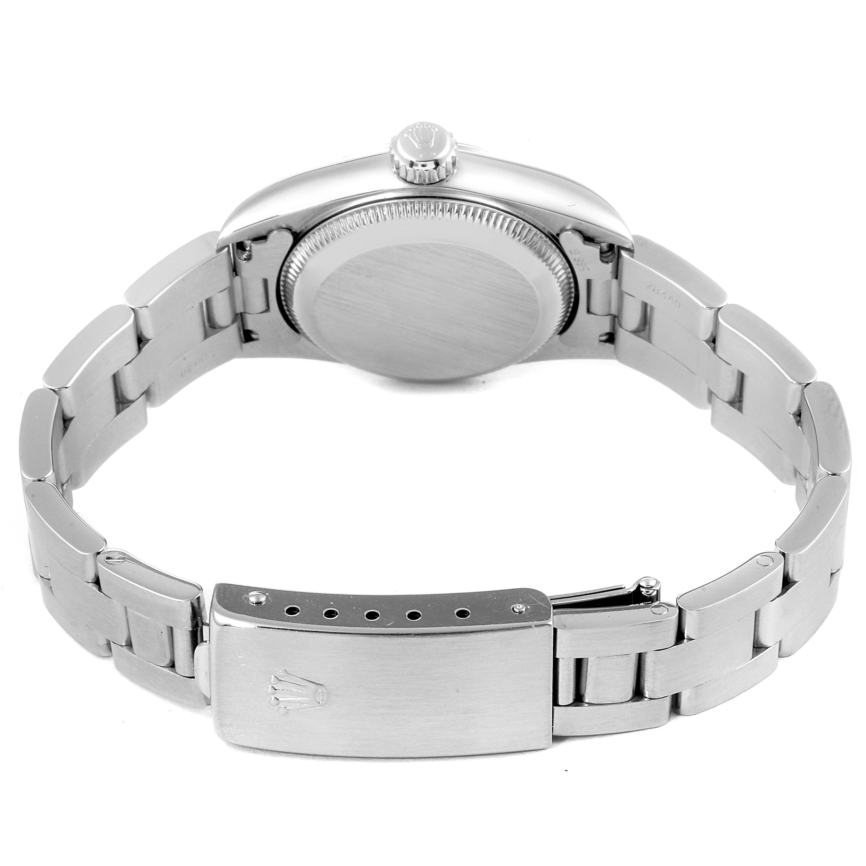This image shows the back view of a Rolex Oyster Perpetual 67180 Women's Stainless Steel White Dial 67180 Women's Stainless Steel White Dial watch, highlighting the case back and bracelet with the clasp open.