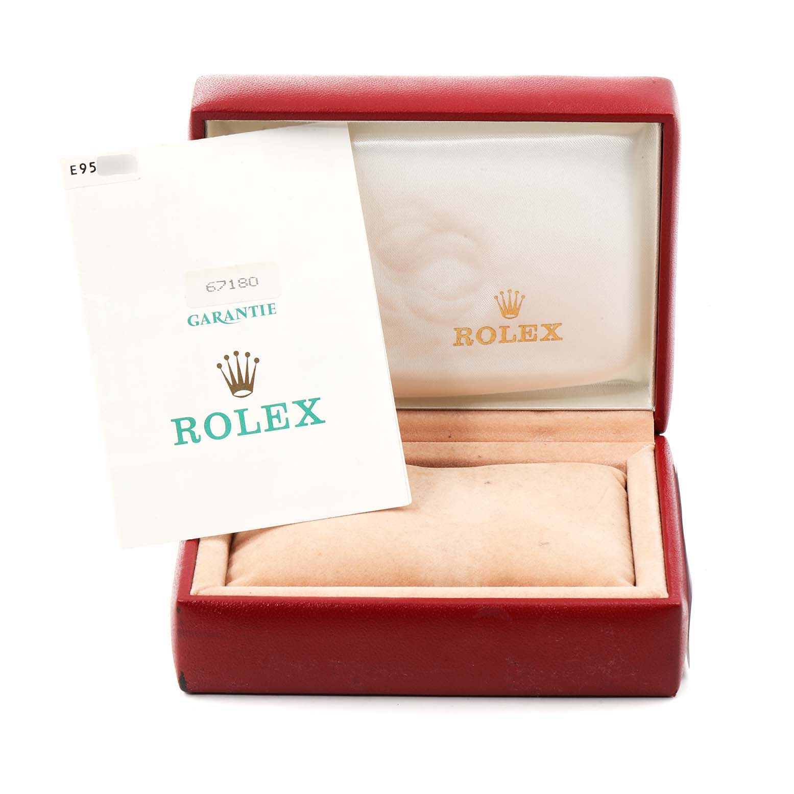 The image shows a Rolex Oyster Perpetual 67180 Women's Stainless Steel Black Dial 67180 Women's Stainless Steel Black Dial watch box with the warranty card placed in front of it.