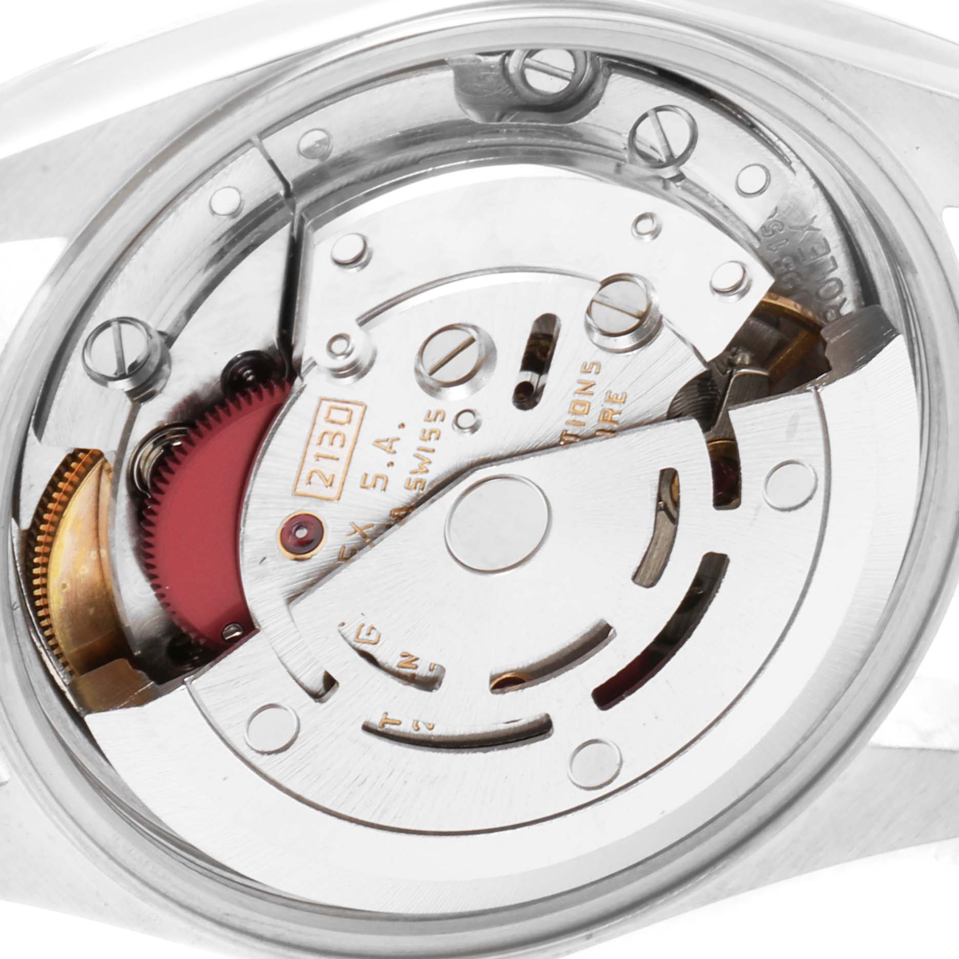 The image shows the intricate inner mechanism of a Rolex Oyster Perpetual 67180 Women's Stainless Steel Black Dial 67180 Women's Stainless Steel Black Dial watch from a back angle.