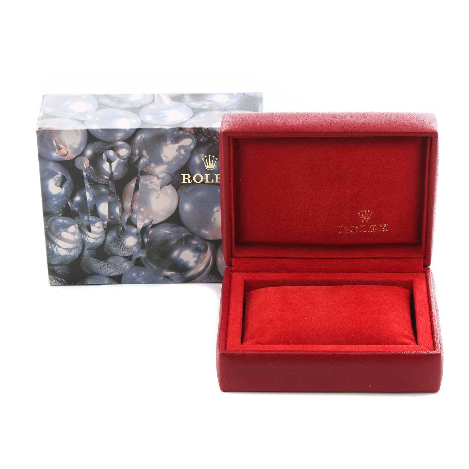 The image shows a red velvet Rolex watch box with an open lid, featuring the Oyster Perpetual model branding.