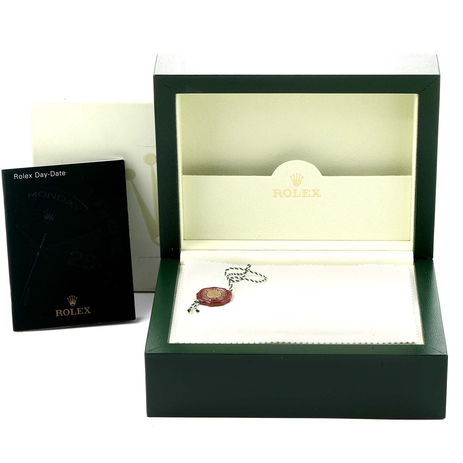 This image shows the open box and accessories for a Rolex President 118238 Men
s Yellow Gold White Dial 118238 Men
s Yellow Gold White Dial model, with an empty watch slot and accompanying booklet.