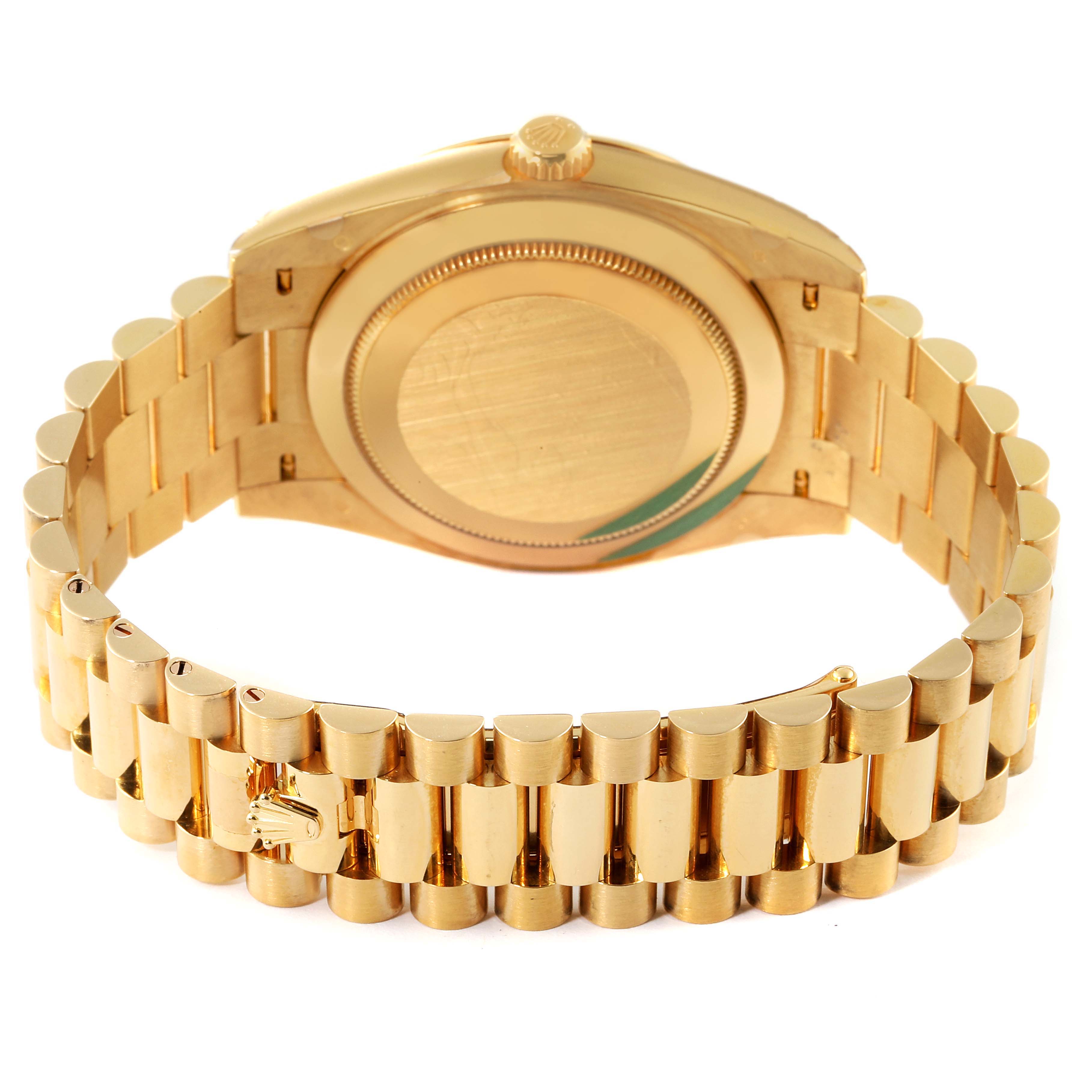 This image displays the back view of a Rolex President 228238 Men's Yellow Gold Champagne Dial 228238 Men's Yellow Gold Champagne Dial model watch, showing the case back and the iconic gold bracelet.