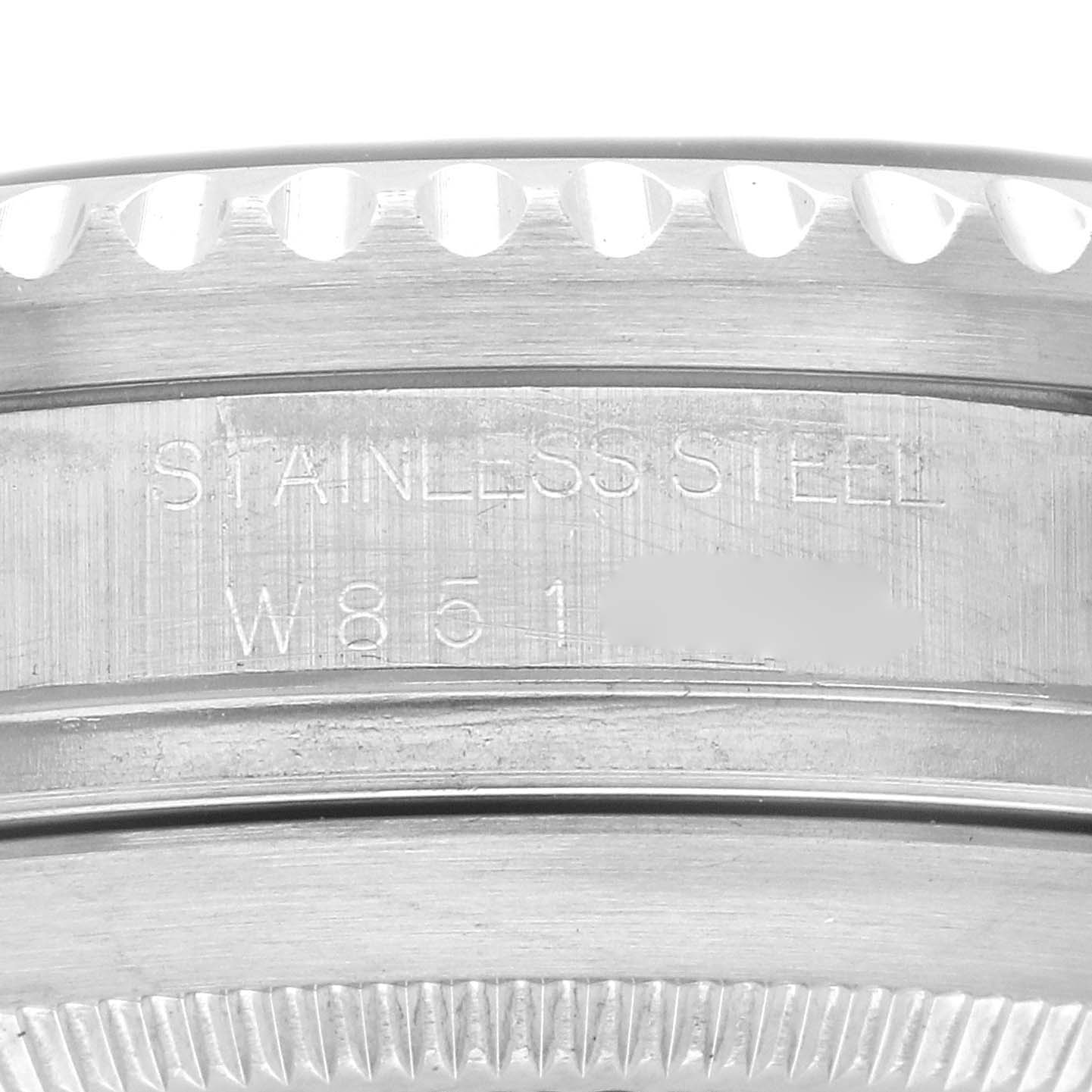 The image shows a close-up of the side of a Rolex Sea-Dweller 16600 Men's Stainless Steel Black Dial 16600 Men's Stainless Steel Black Dial watch case, highlighting the engraving and stainless steel material.