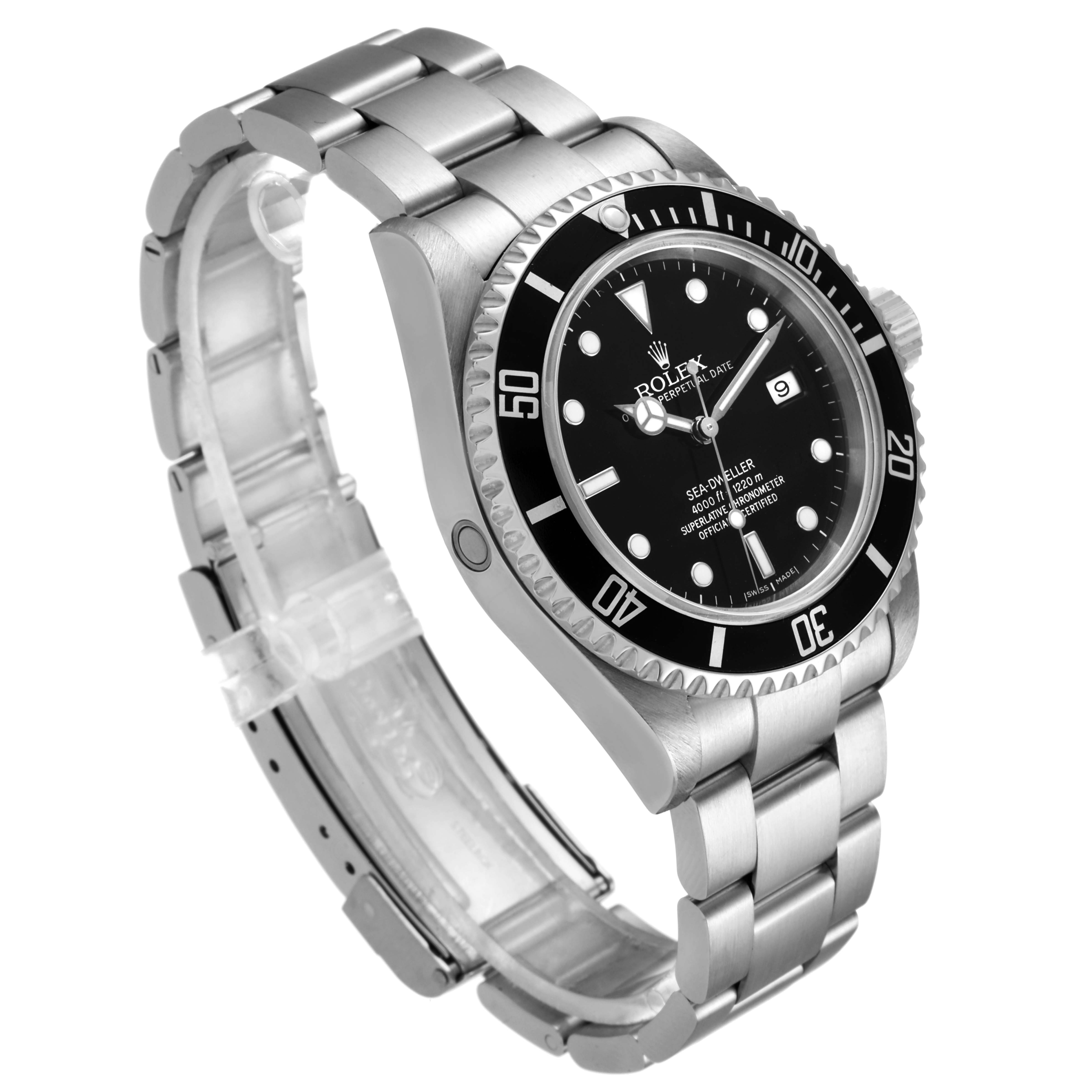The image shows a Sea-Dweller Rolex watch at an angle displaying the dial, bezel, crown, and bracelet.