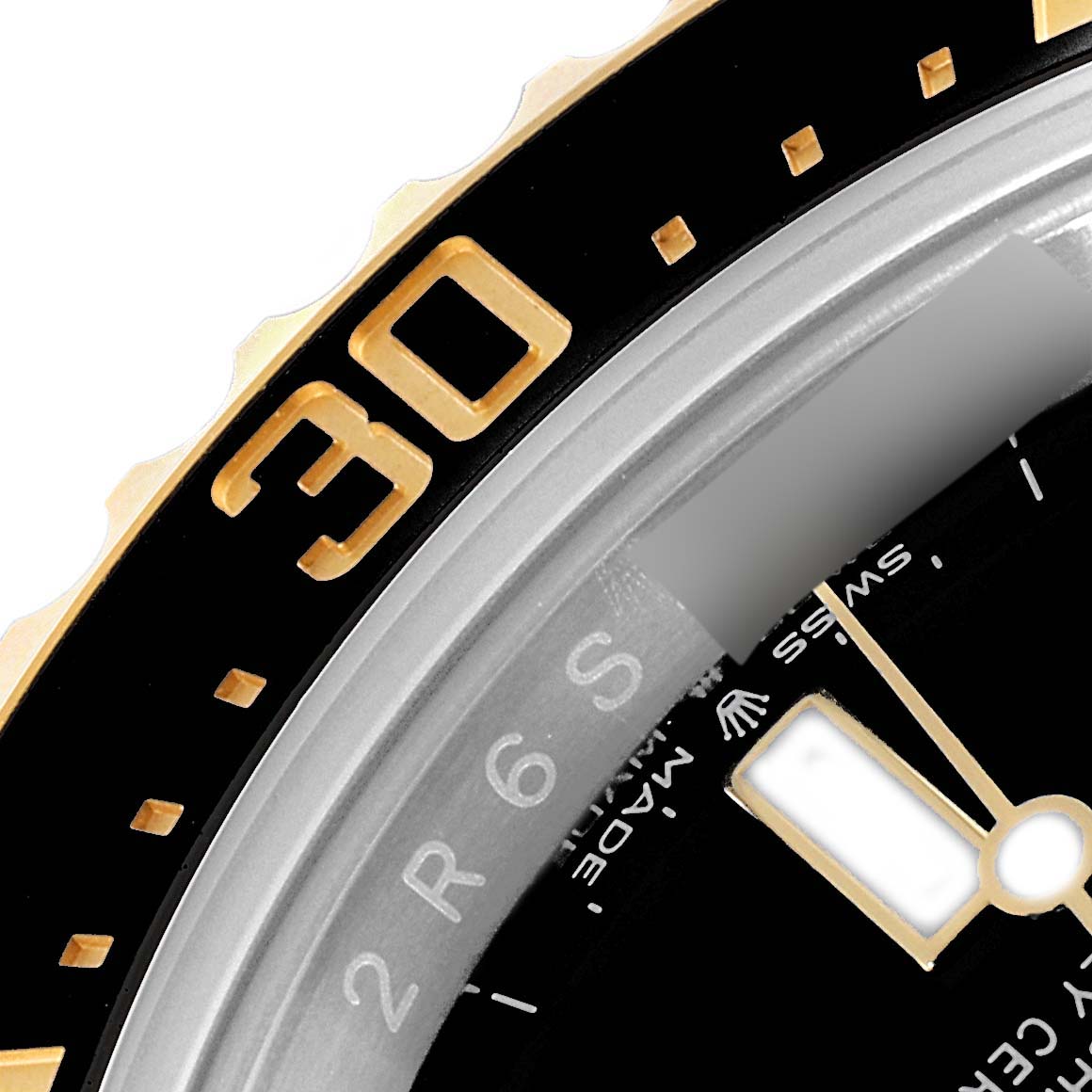 This close-up shows the bezel and a portion of the dial and minute hand of the Rolex Sea-Dweller 126603 Men's Steel and Gold (two tone) Black Dial 126603 Men's Steel and Gold (two tone) Black Dial watch.