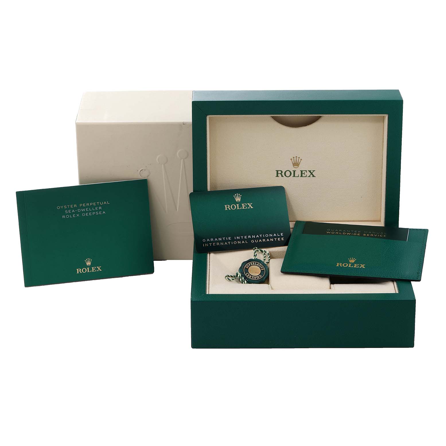 This image shows the packaging, booklets, and guarantee card for a Rolex Sea-Dweller 126603 Men's Steel and Gold (two tone) Black Dial 126603 Men's Steel and Gold (two tone) Black Dial watch, presented from a slightly elevated angle.