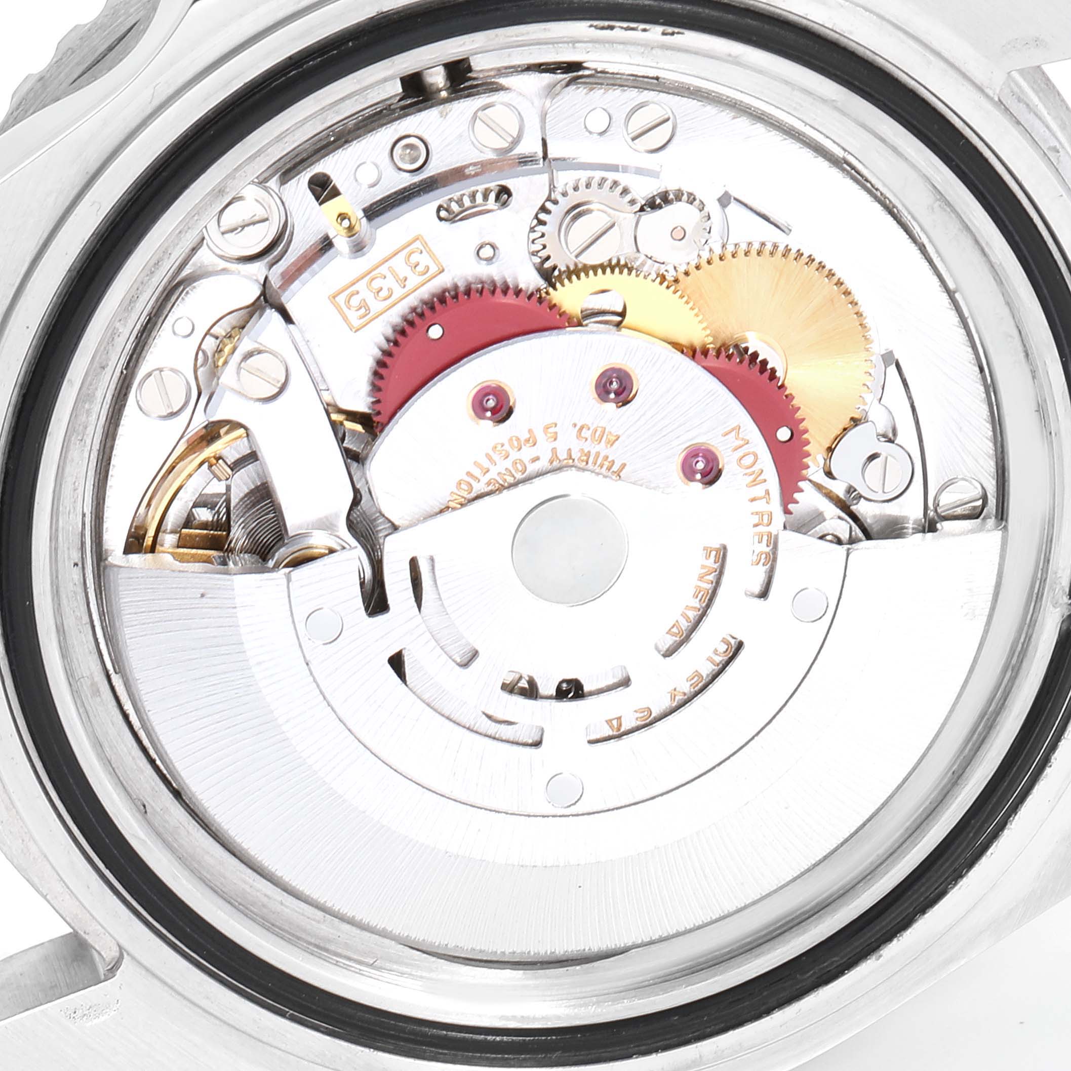 This image shows the movement of a Rolex Submariner 16610 Men
s Stainless Steel Black Dial 16610 Men
s Stainless Steel Black Dial watch from a view inside the case back.