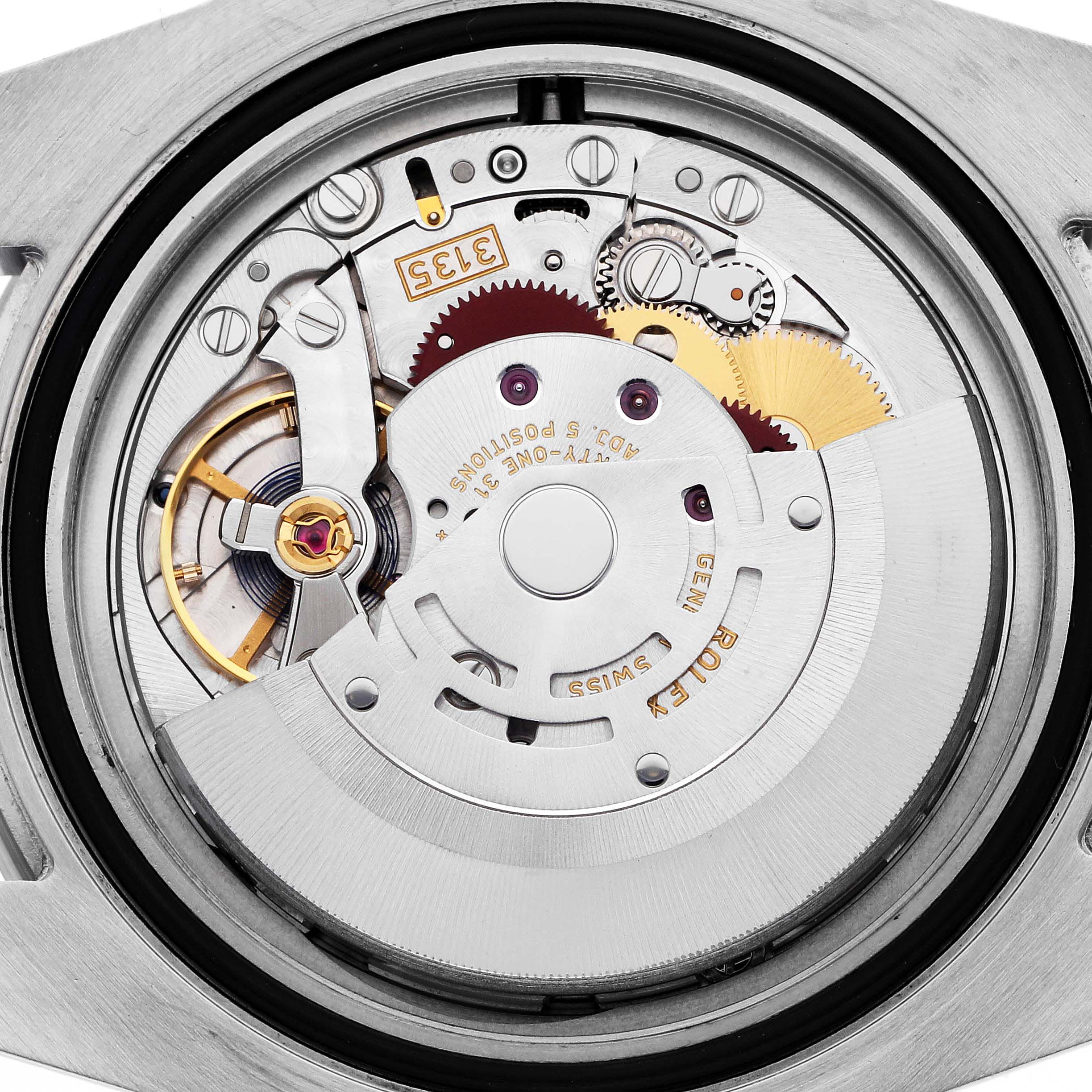 The image shows the intricate interior movement of a Rolex Submariner 116610 Men's Stainless Steel Black Dial 116610 Men's Stainless Steel Black Dial watch, viewed from the back.