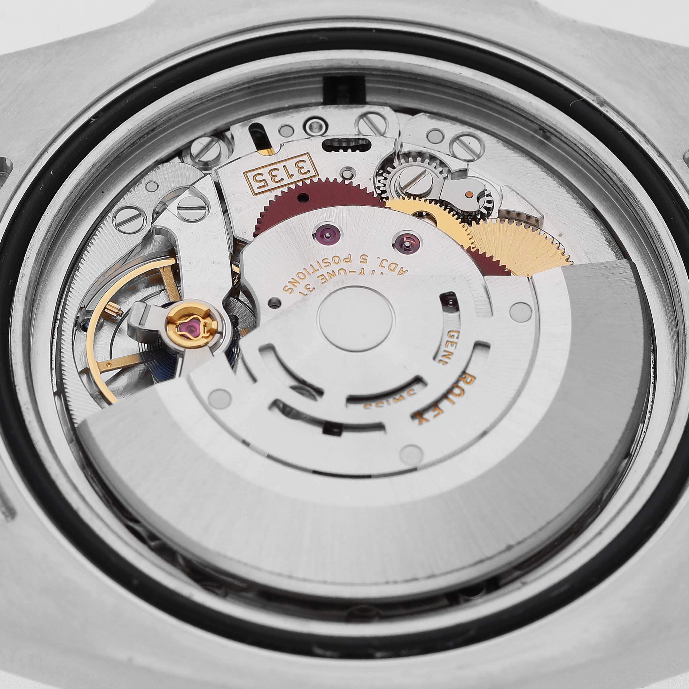 The image shows the internal movement mechanism of a Rolex Submariner 116610 Men's Stainless Steel Black Dial watch, viewed from its back.