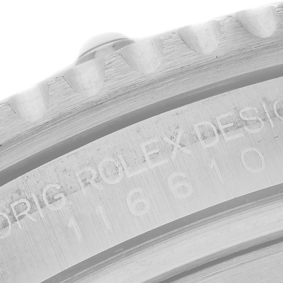 The image shows the engraved back of a Rolex Submariner 116610 Men's Stainless Steel Black Dial watch, highlighting the model and design details.