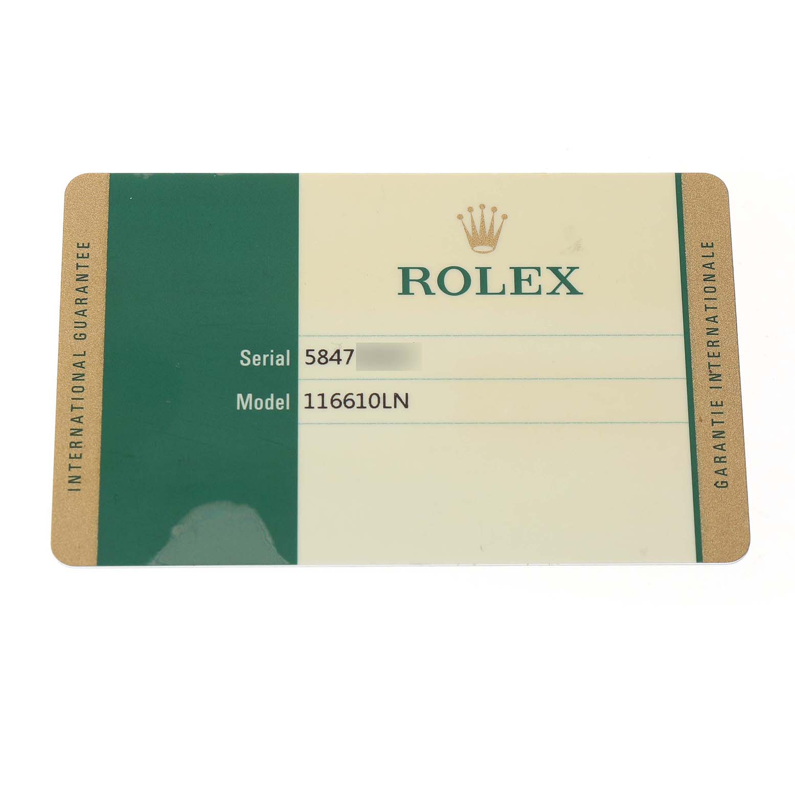 The image shows a Rolex international guarantee card for the Submariner model 116610LN.