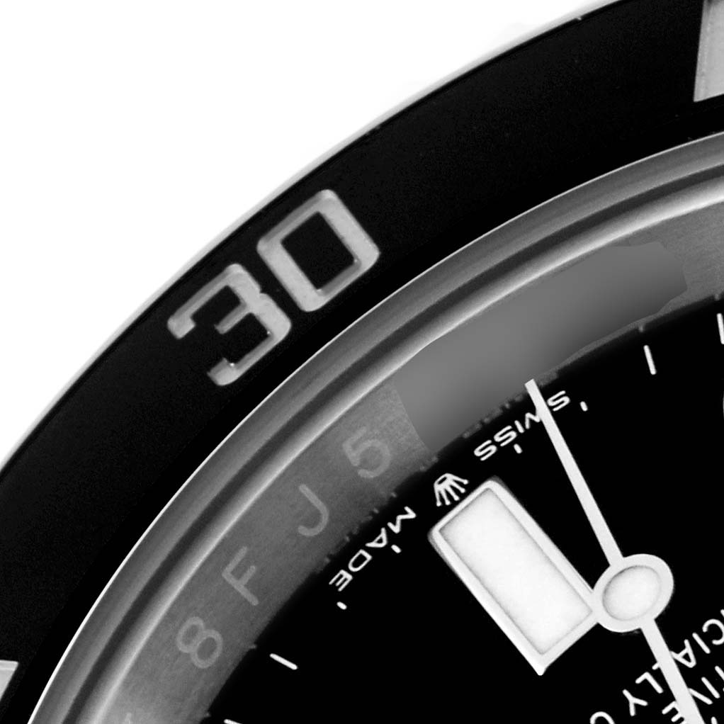 The image shows a close-up of the bezel, markers, and hands of a Rolex Submariner 124060 Men's Stainless Steel Black Dial 124060 Men's Stainless Steel Black Dial watch.