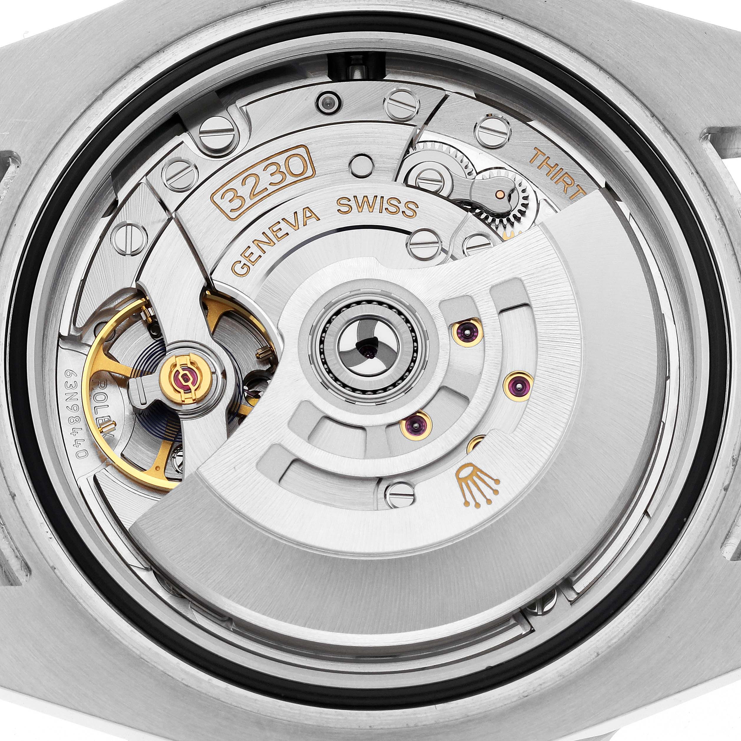 This image shows the internal movement of a Rolex Submariner 124060 Men's Stainless Steel Black Dial 124060 Men's Stainless Steel Black Dial watch from a rear angle, highlighting its intricate components.