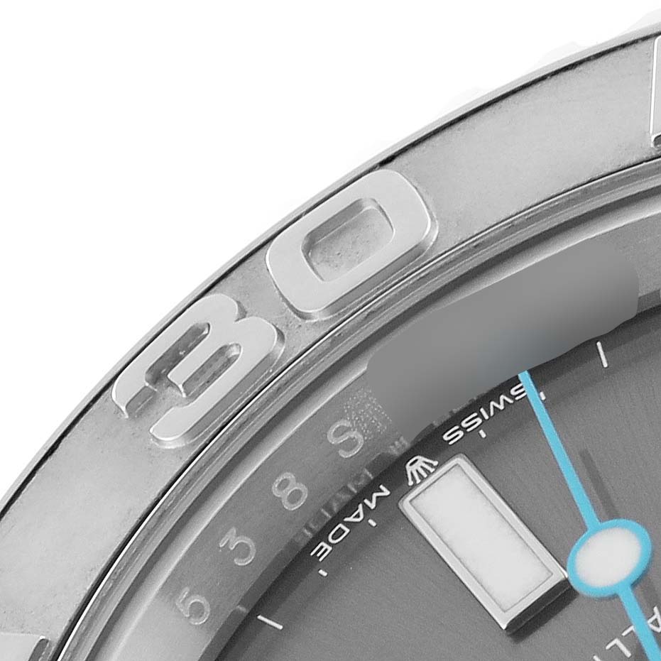 This close-up image of the Rolex Yacht-Master 126622 Men's Stainless Steel Grey Dial 126622 Men's Stainless Steel Grey Dial watch shows the bezel, part of the dial, and the seconds hand.